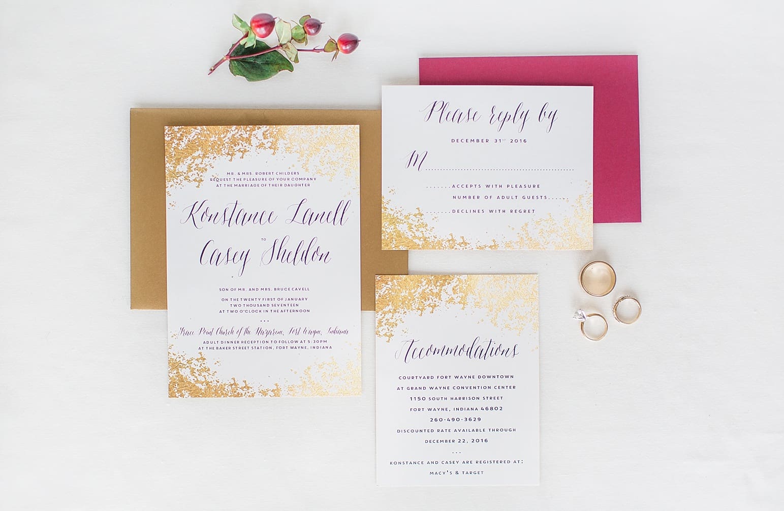 Arielle Peters Photography | Wedding invitations and ring on white background on wedding day at Baker Street Train Station in Fort Wayne, Indiana.