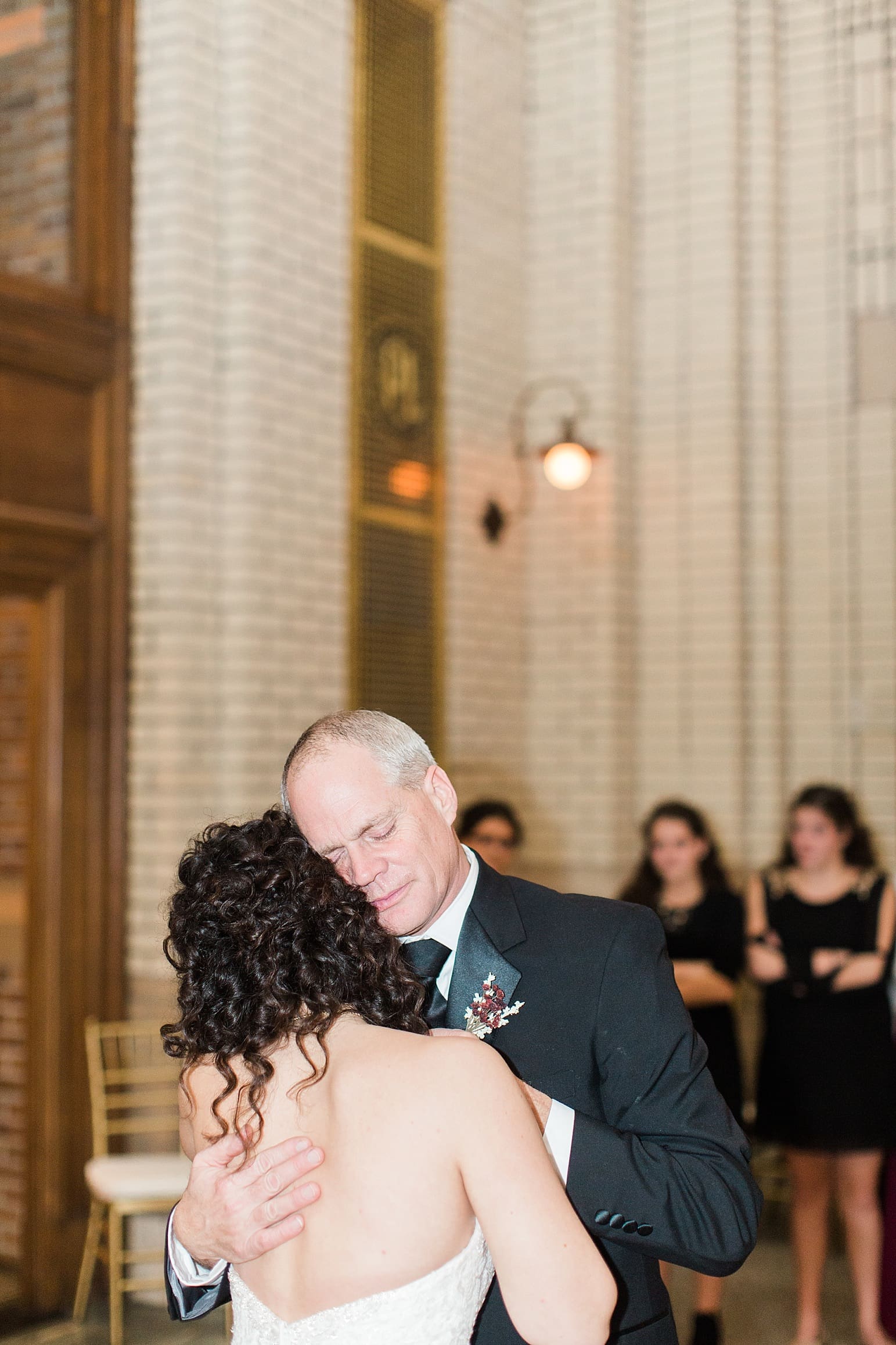 Arielle Peters Photography | Father of bride and bride dancing at wedding reception at Baker Street Train Station in Fort Wayne, Indiana.