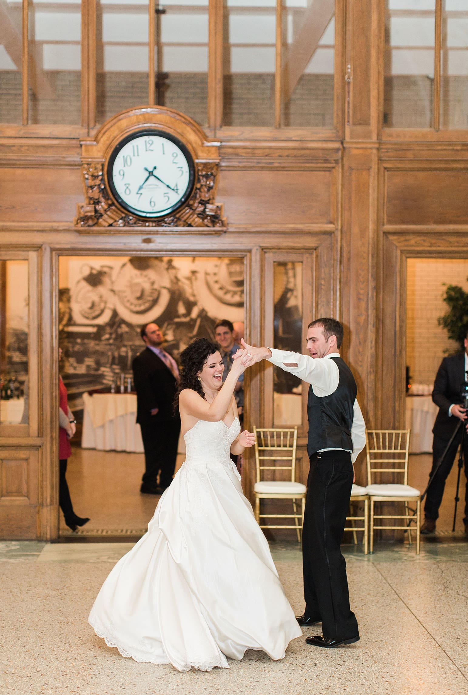 Arielle Peters Photography | Bride and groom sharing first dance at wedding reception at Baker Street Train Station in Fort Wayne, Indiana.
