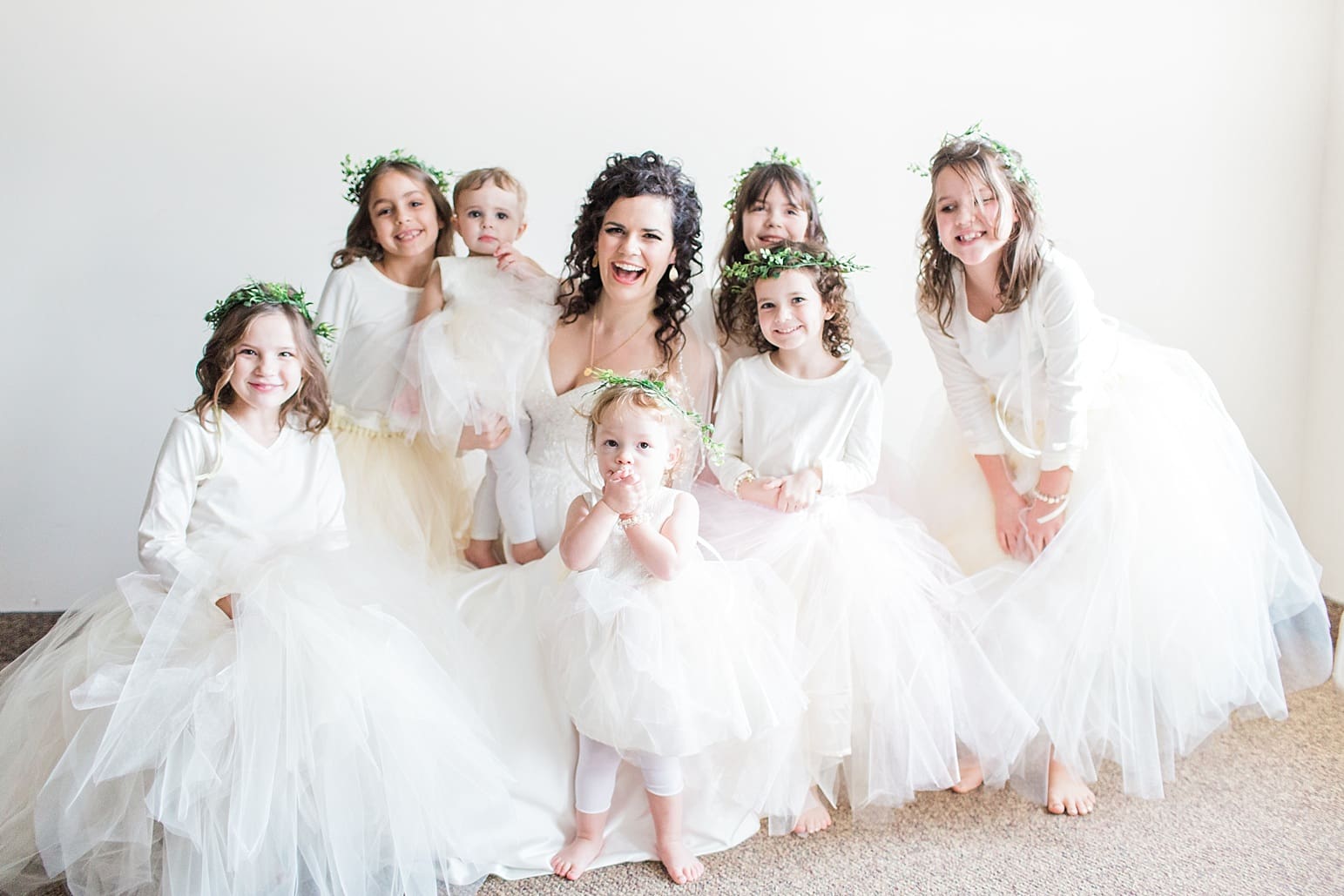 Arielle Peters Photography | Bride and flower girls on wedding day at Baker Street Train Station in Fort Wayne, Indiana.