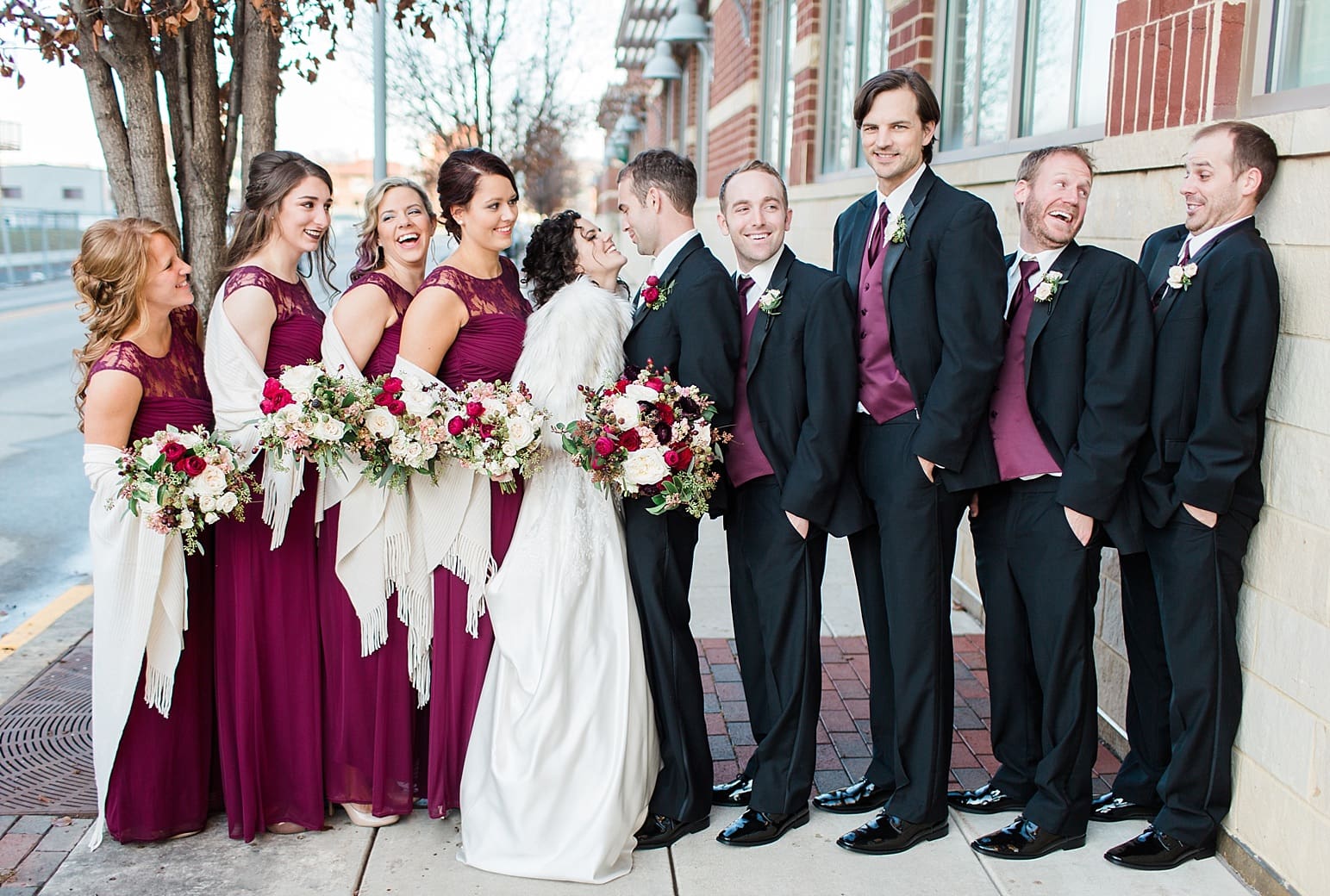 Arielle Peters Photography | Wedding party on city streets on wedding day at Baker Street Train Station in Fort Wayne, Indiana.