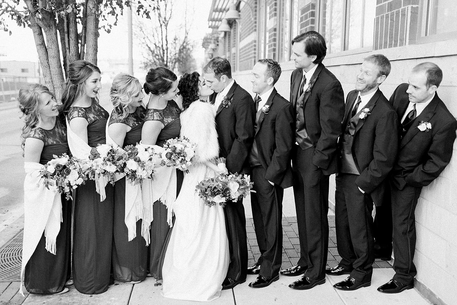 Arielle Peters Photography | Wedding party on city streets on wedding day at Baker Street Train Station in Fort Wayne, Indiana.