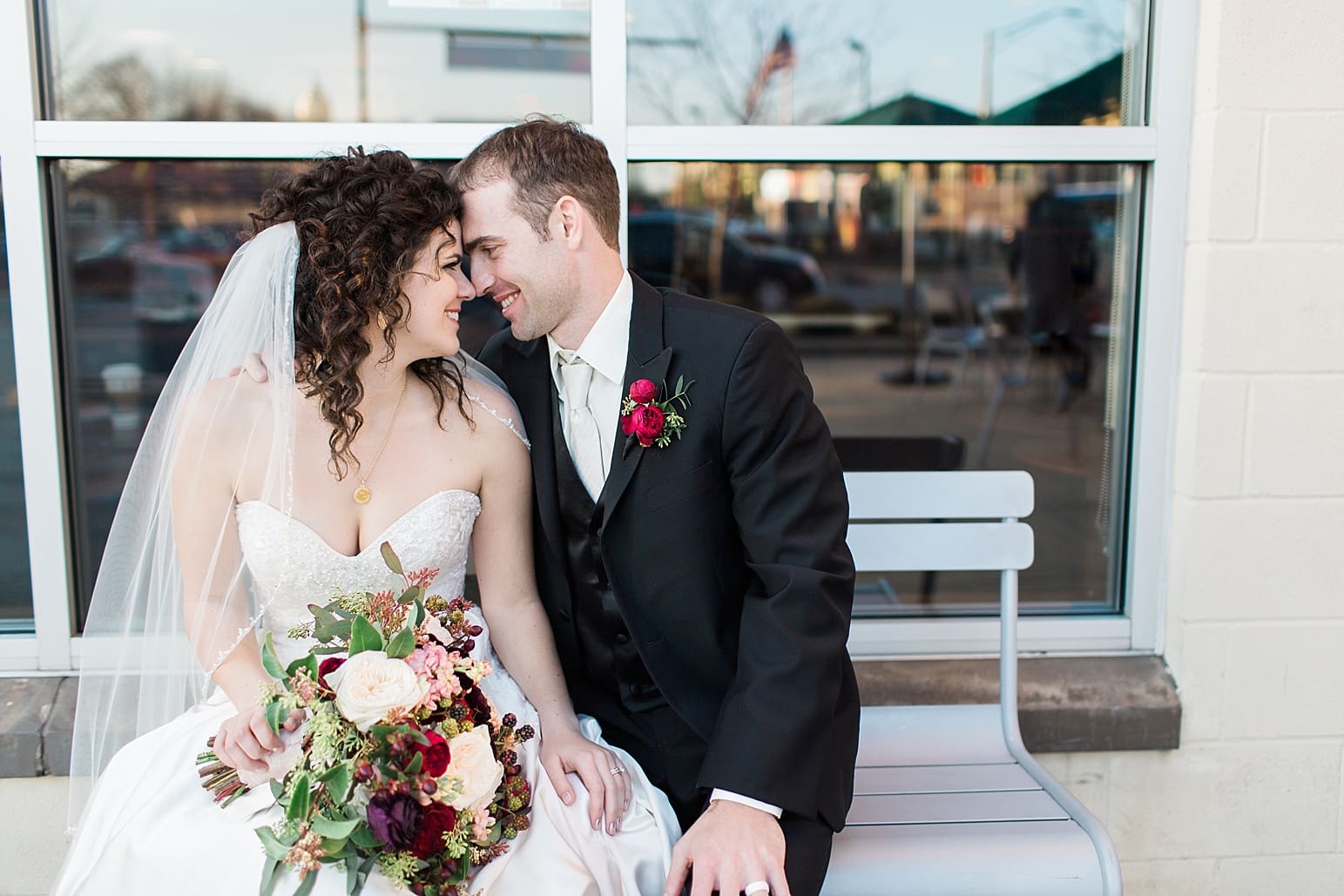 Arielle Peters Photography | Bride and groom at Starbucks on wedding day at Baker Street Train Station in Fort Wayne, Indiana.