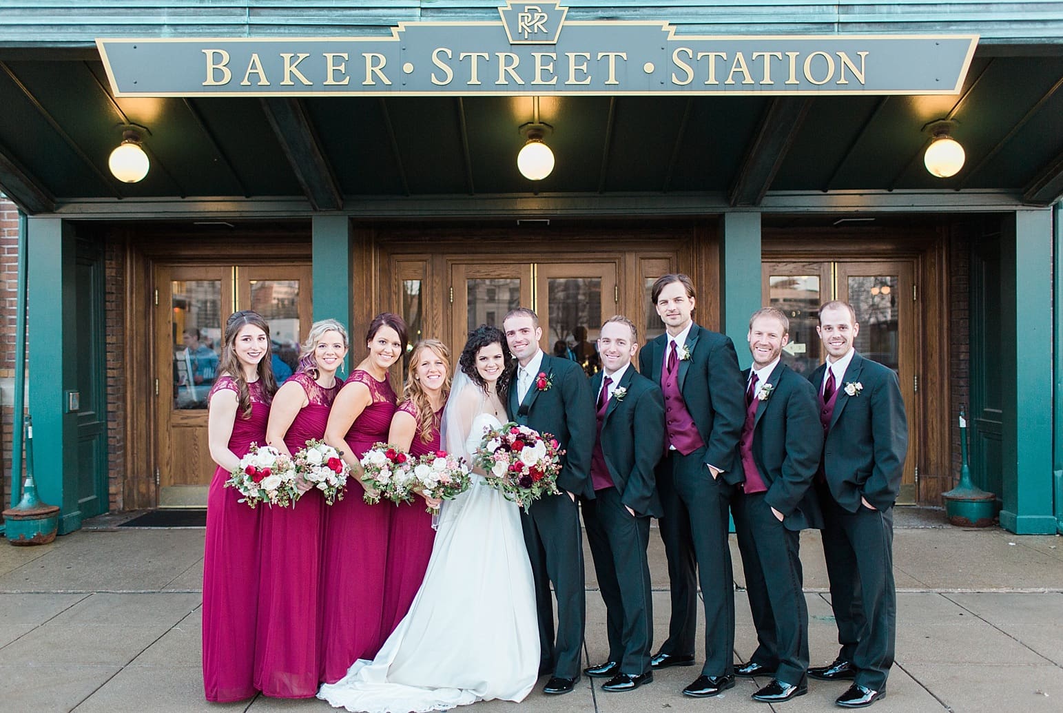 Arielle Peters Photography | Wedding party outside train station on wedding day at Baker Street Train Station in Fort Wayne, Indiana.