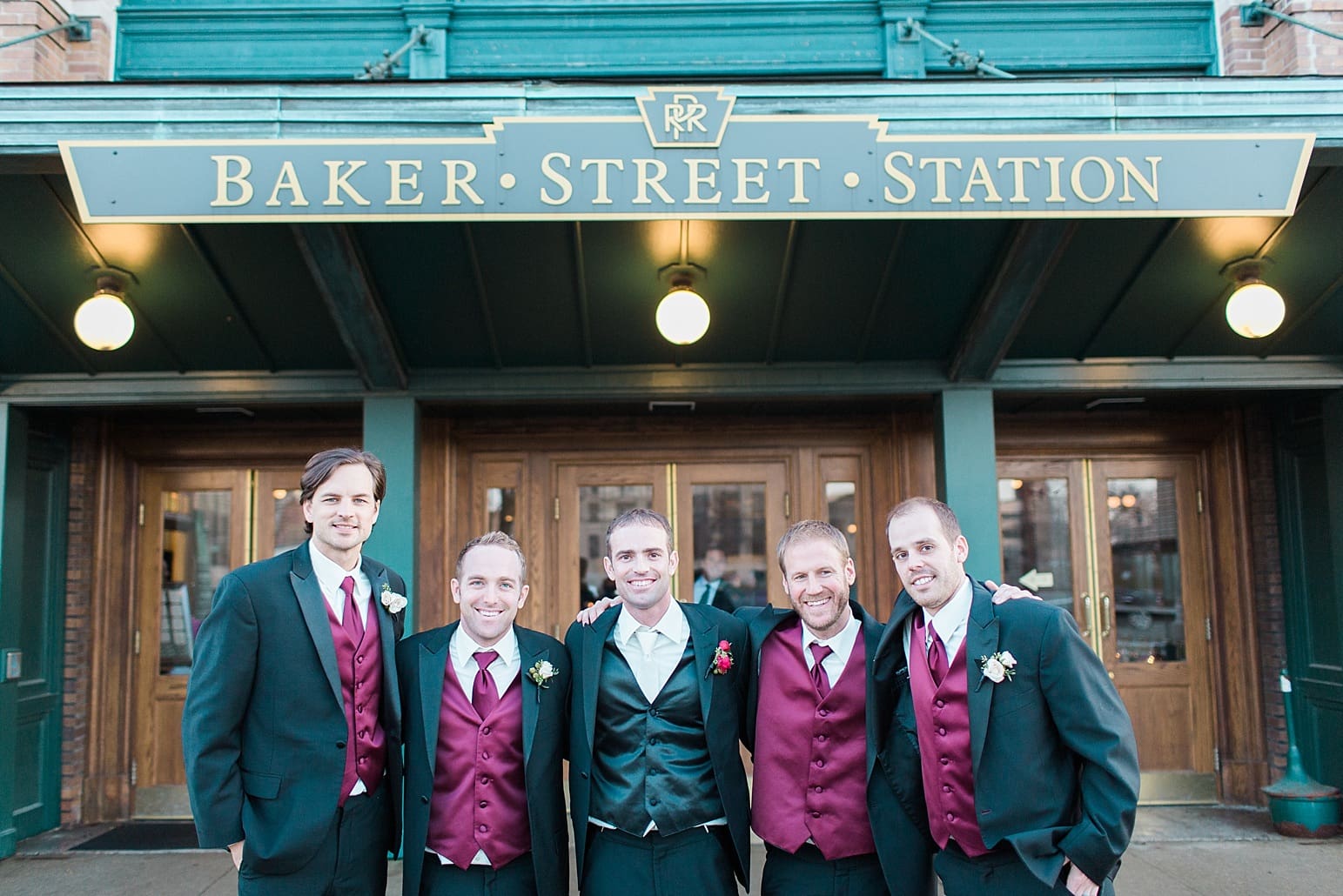 Arielle Peters Photography | Groom and groomsmen on wedding day outside Baker Street Train Station in Fort Wayne, Indiana.