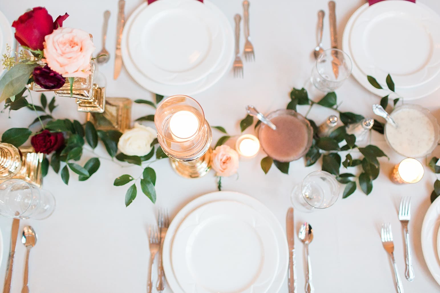 Arielle Peters Photography | Wedding reception table settings and floral arrangements at Baker Street Train Station in Fort Wayne, Indiana.
