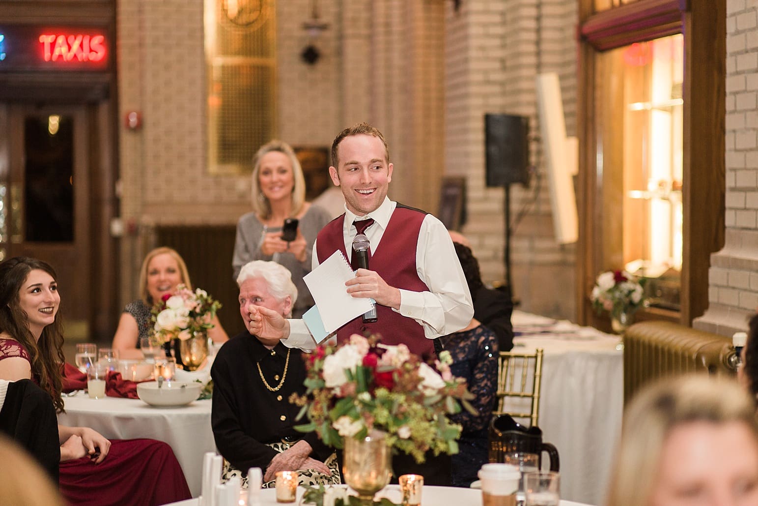 Arielle Peters Photography | Best man giving toast at wedding reception at Baker Street Train Station in Fort Wayne, Indiana.