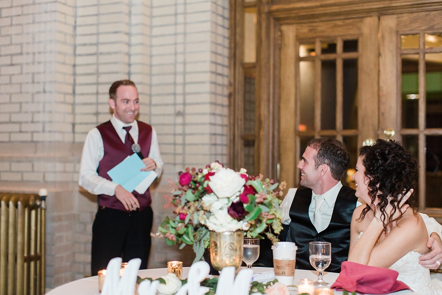 Arielle Peters Photography | Best man giving toast at wedding reception at Baker Street Train Station in Fort Wayne, Indiana.