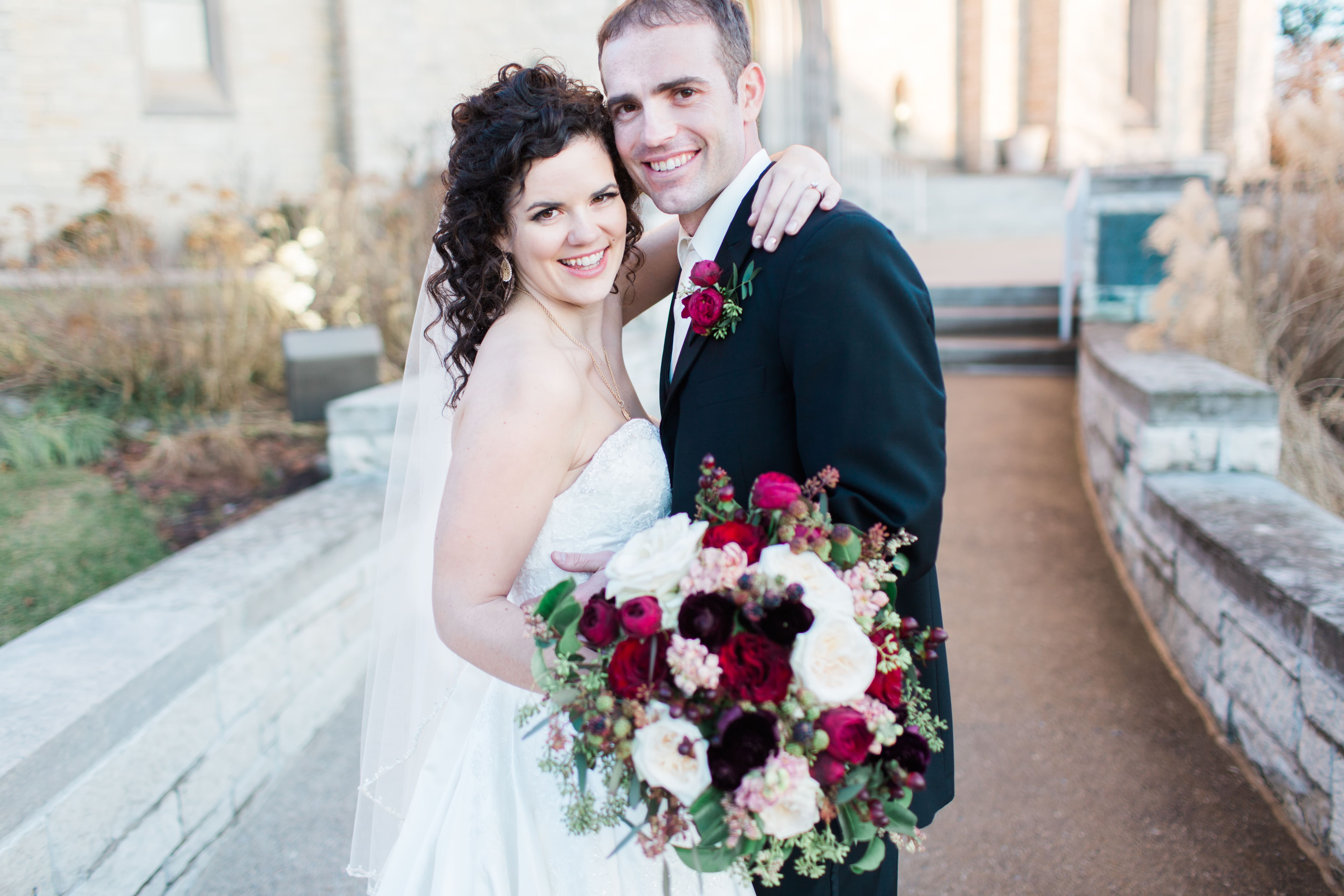 Arielle Peters Photography taking a couple’s wedding day photos at Baker Street Train Station in Fort Wayne,, Indiana.