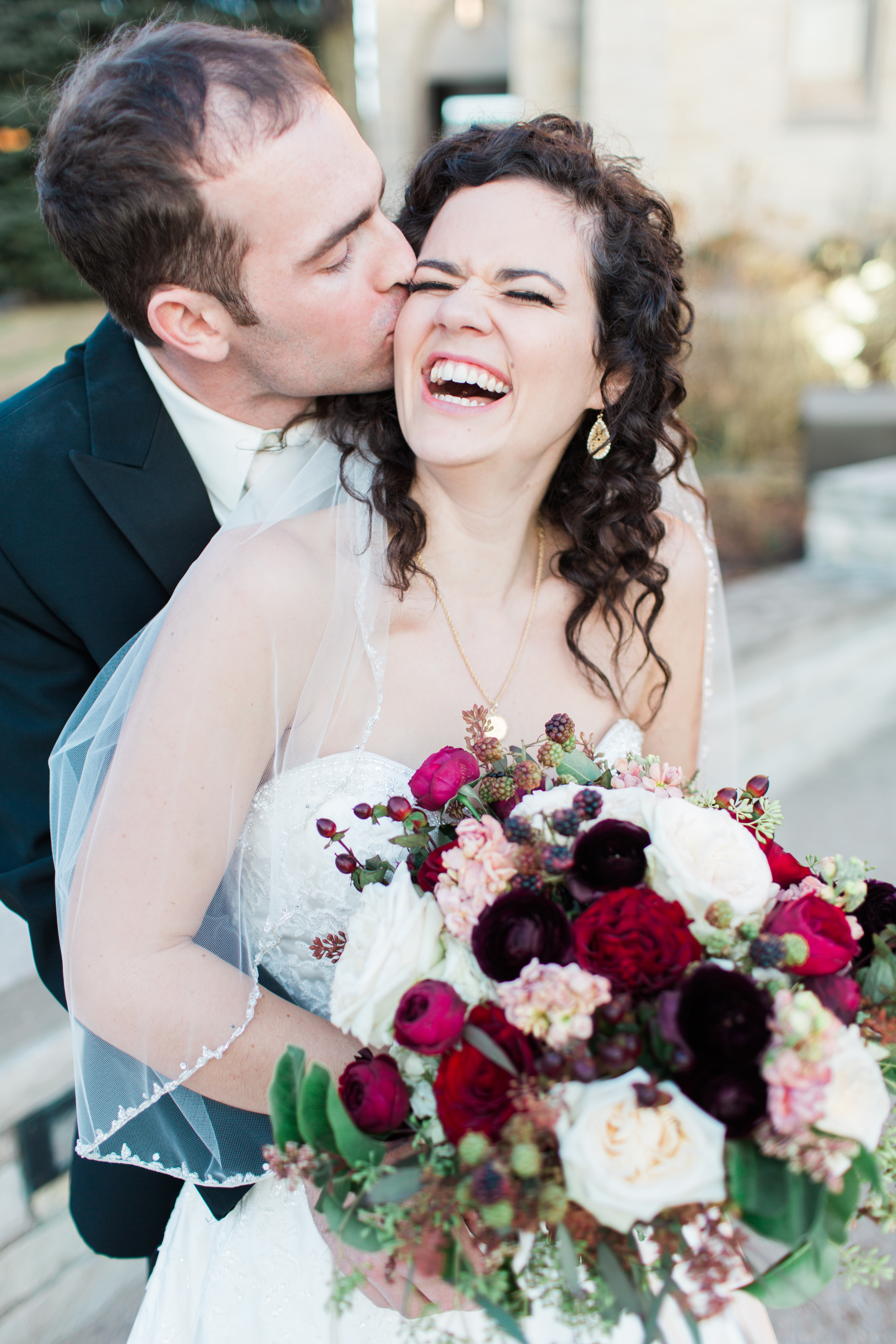 Arielle Peters Photography taking a couple’s wedding day photos at Baker Street Train Station in Fort Wayne,, Indiana.