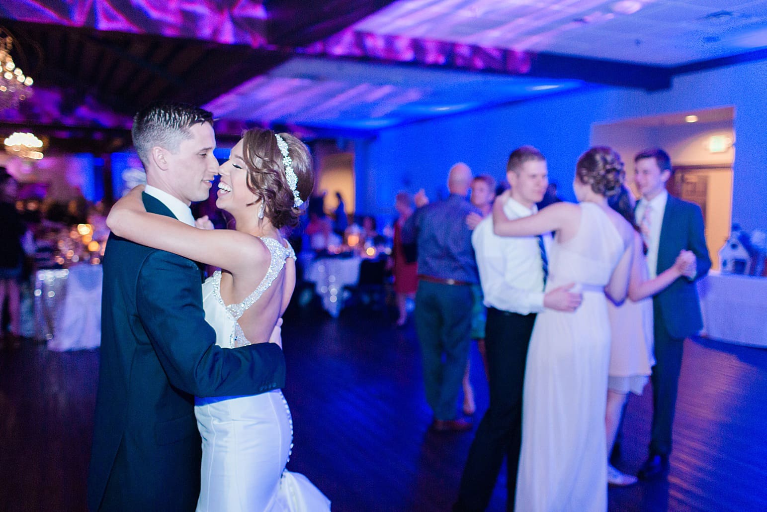 Arielle Peters Photography | Bride and groom laughing and dancing at wedding reception at The Market in Valparaiso, Indiana.