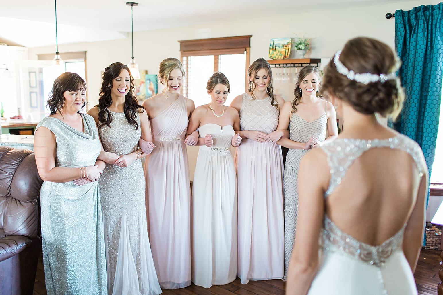 Arielle Peters Photography | Bride and bridesmaids having first reveal on wedding day at The Market in Valparaiso, Indiana.
