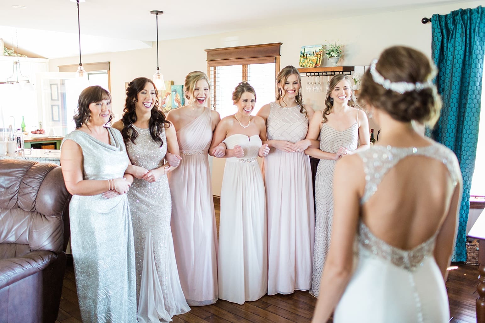 Arielle Peters Photography | Bride and bridesmaids having first reveal on wedding day at The Market in Valparaiso, Indiana.