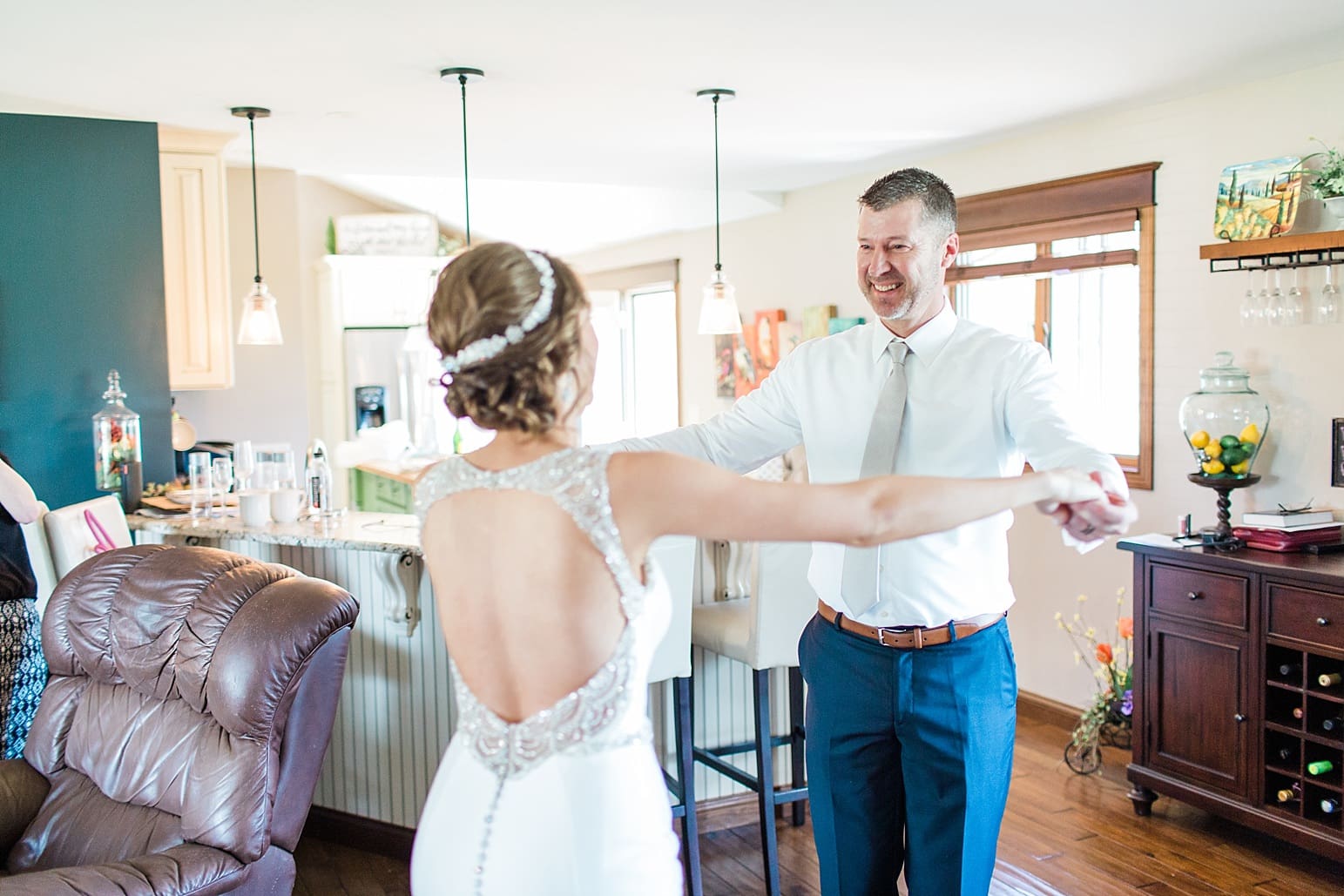 Arielle Peters Photography | Father of bride and bride having first reveal on wedding day at The Market in Valparaiso, Indiana.