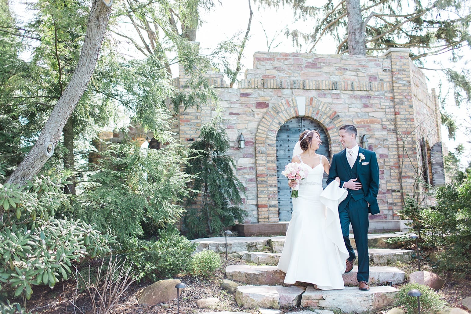 Arielle Peters Photography | Bride and groom walking down old stone steps on wedding day at The Market in Valparaiso, Indiana.