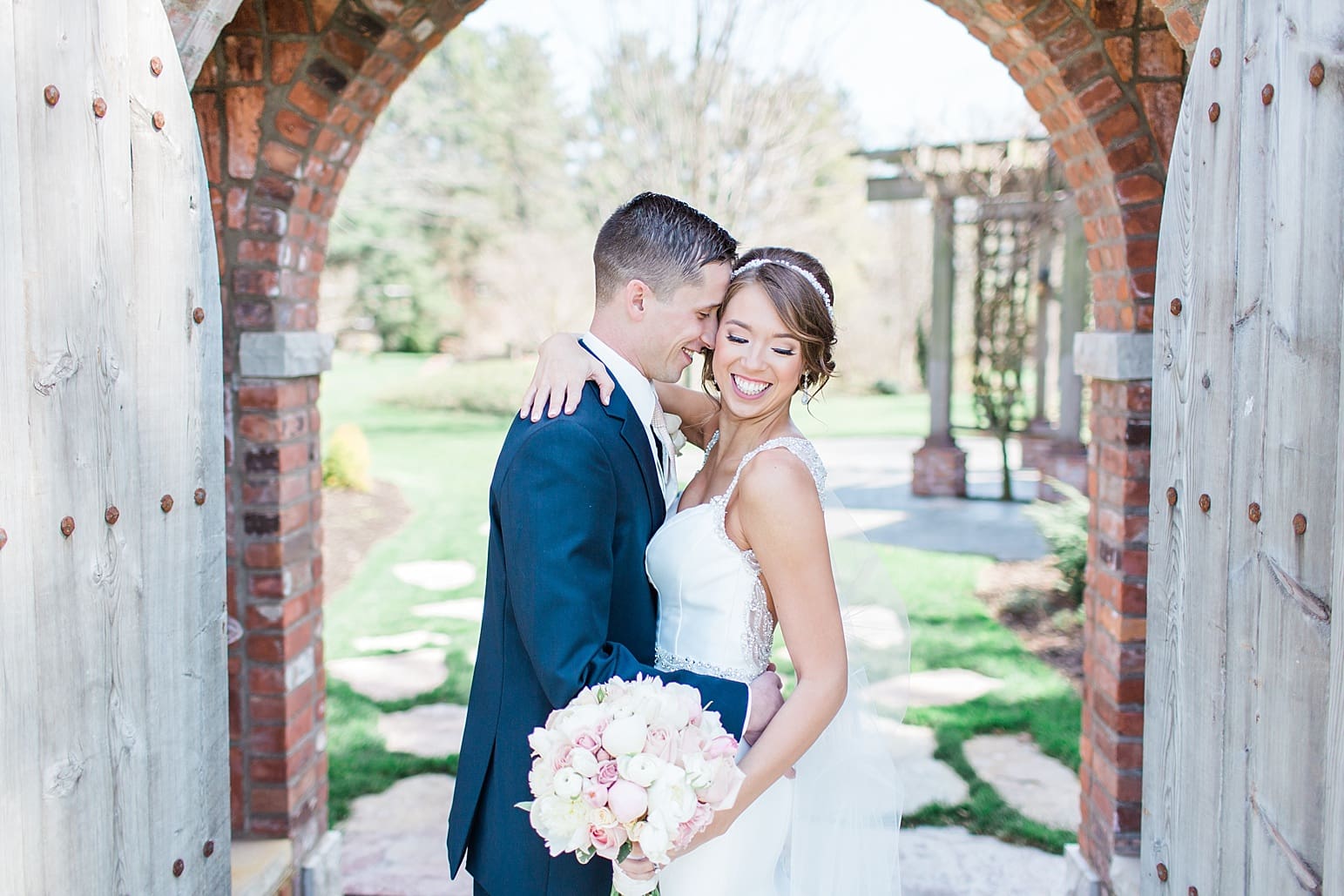 Arielle Peters Photography | Bride and groom under old brick archway on wedding day at The Market in Valparaiso, Indiana.