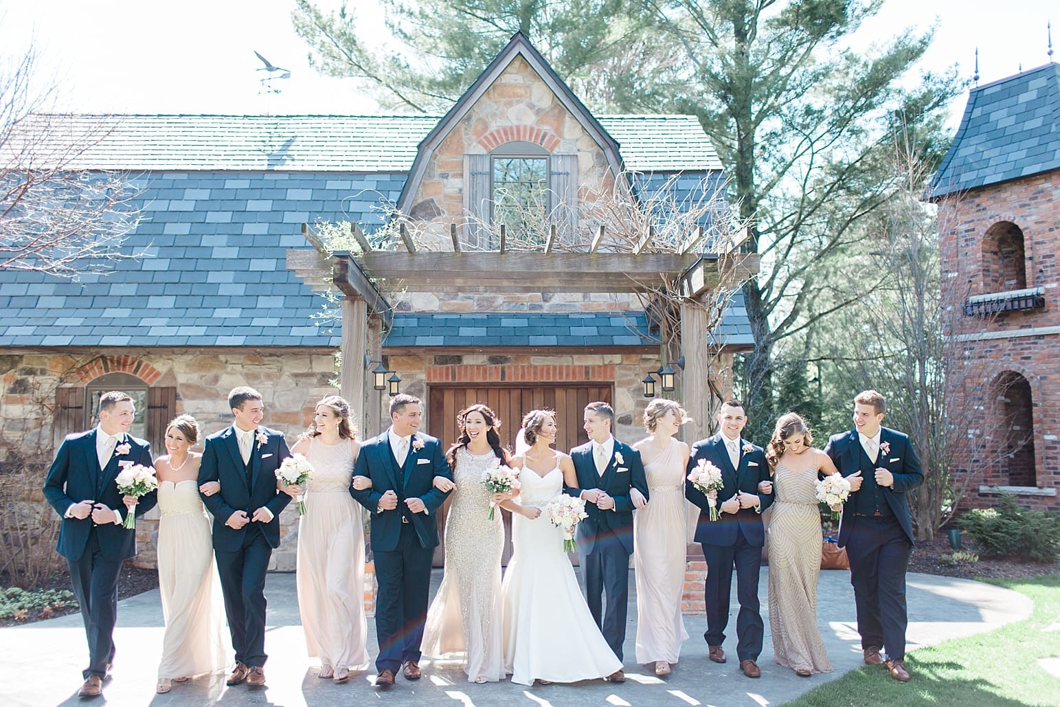 Arielle Peters Photography | Wedding party walking on historic grounds on wedding day at The Market in Valparaiso, Indiana.