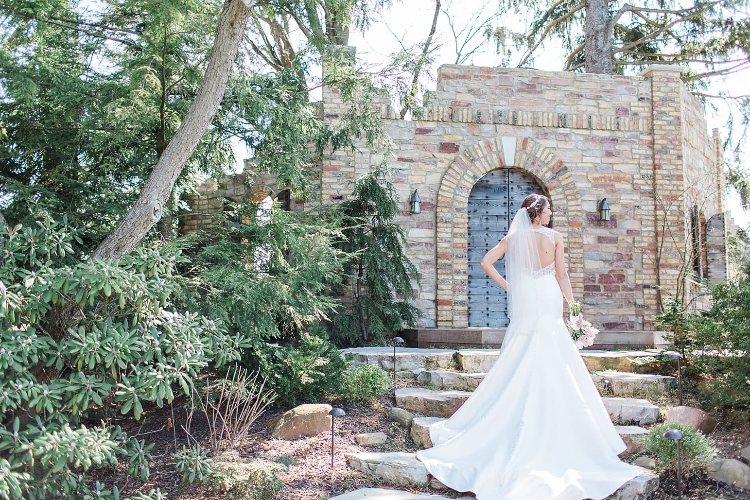 Arielle Peters Photography | Bride walking up old stone steps on wedding day at The Market in Valparaiso, Indiana.