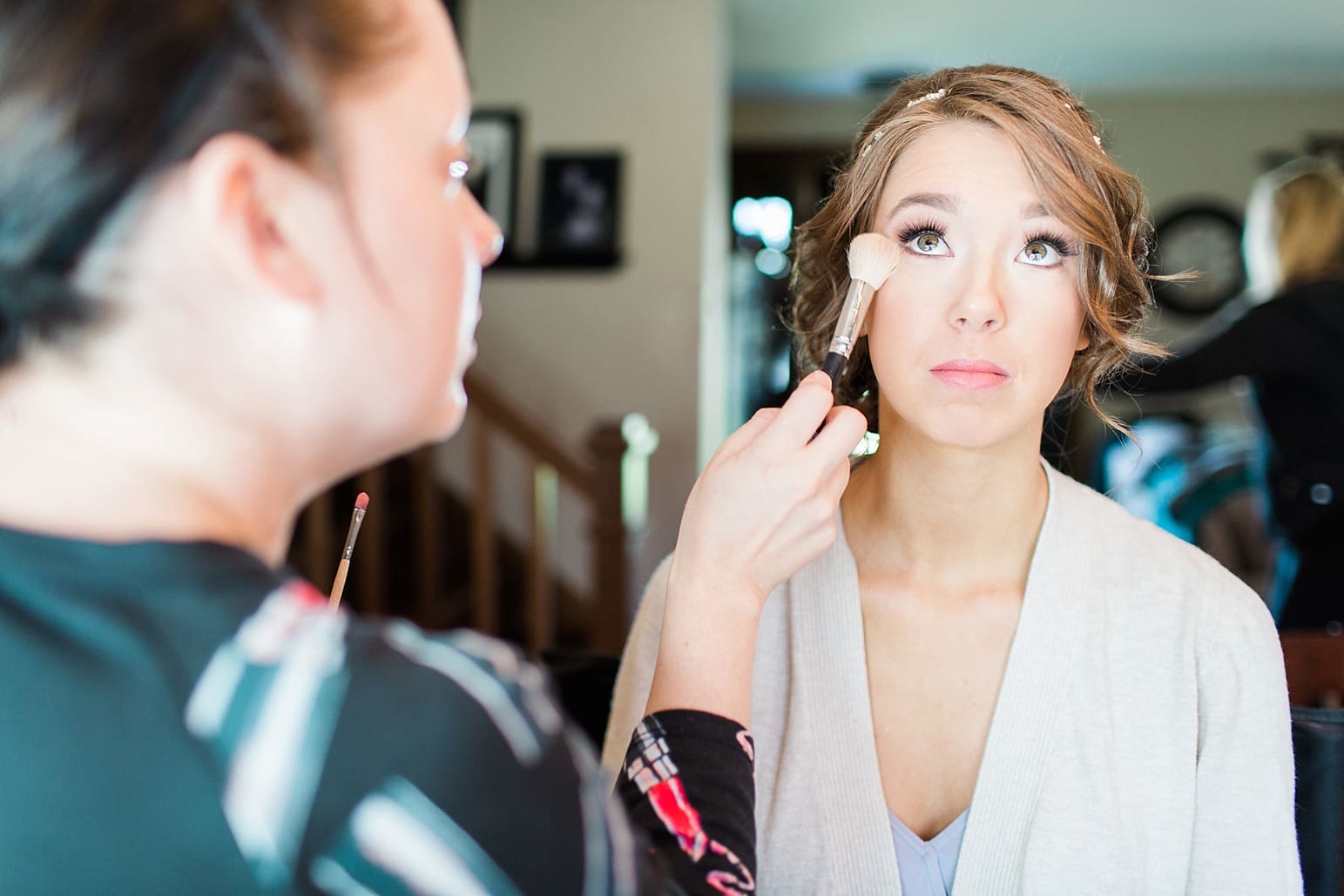 Arielle Peters Photography | Bride having her makeup done on wedding day at The Market in Valparaiso, Indiana.