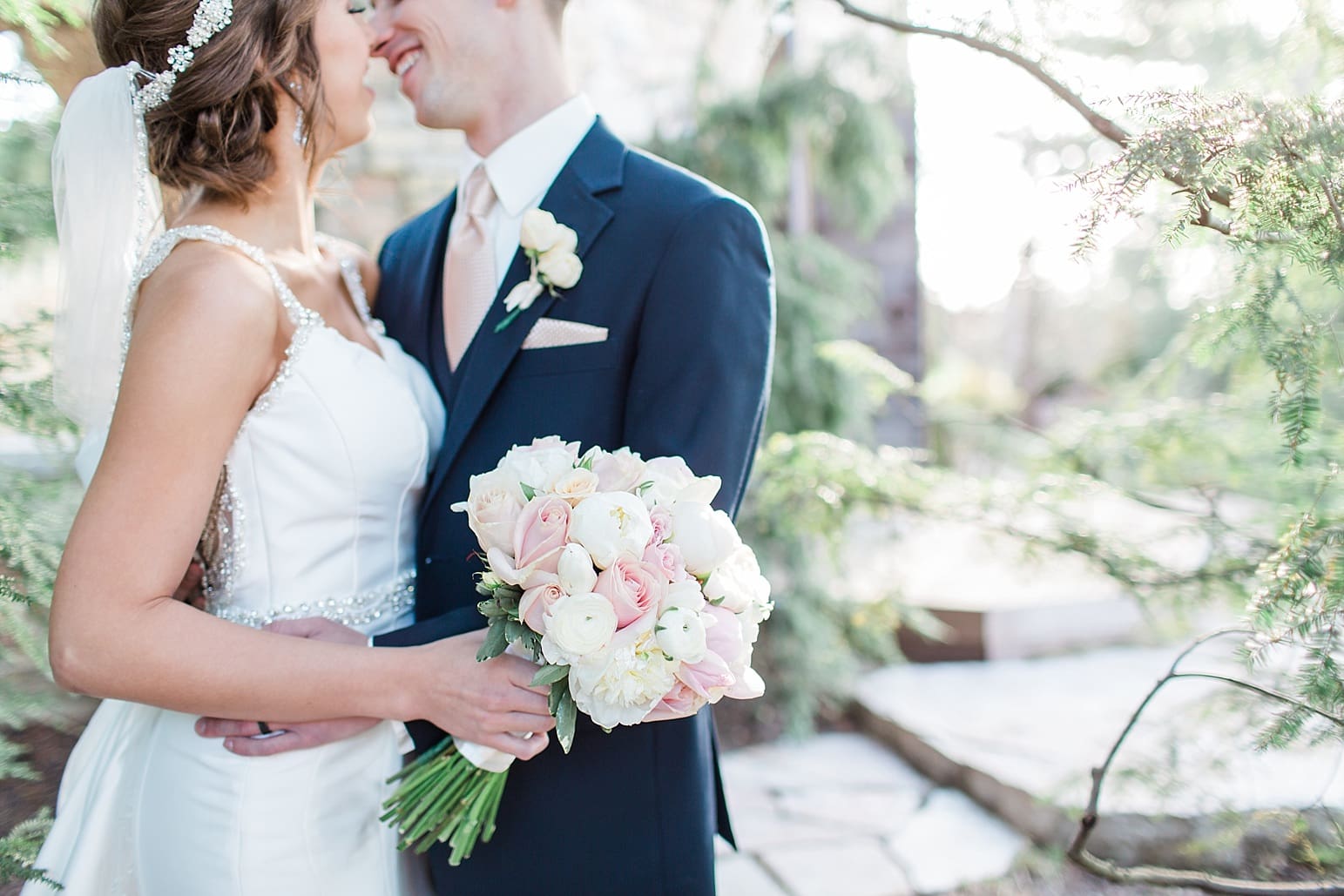 Arielle Peters Photography | Bride and groom almost kissing in overgrown garden on wedding day at The Market in Valparaiso, Indiana.