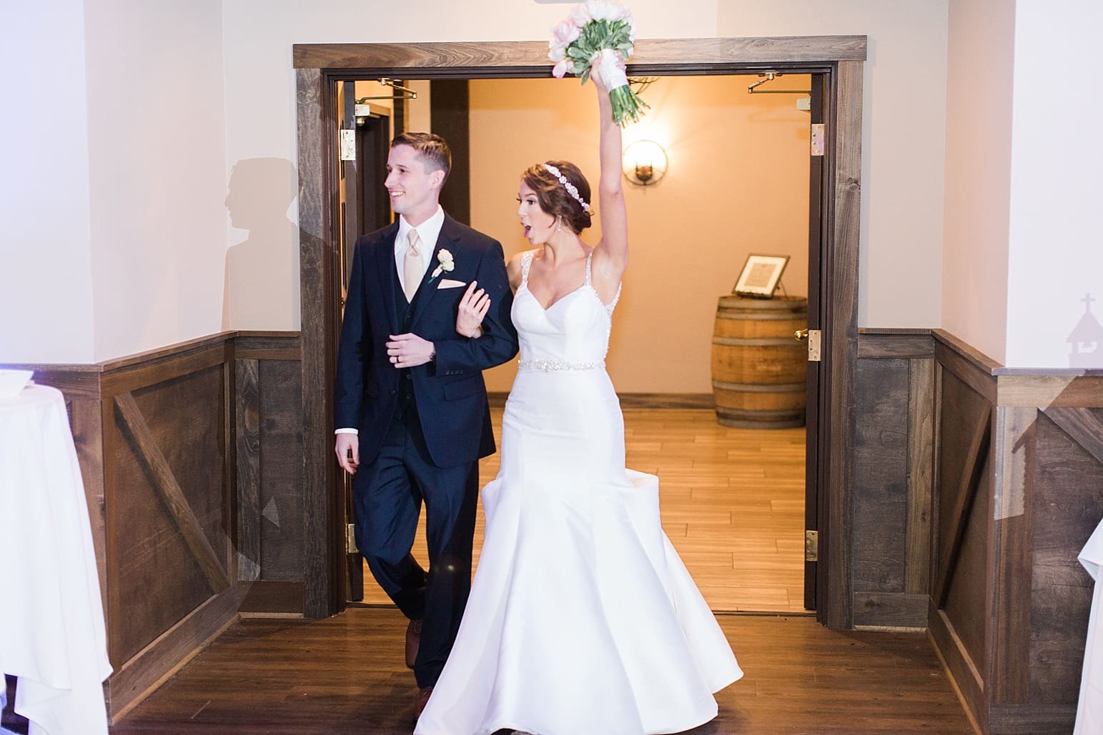Arielle Peters Photography | Bride and groom entering wedding reception at The Market in Valparaiso, Indiana.