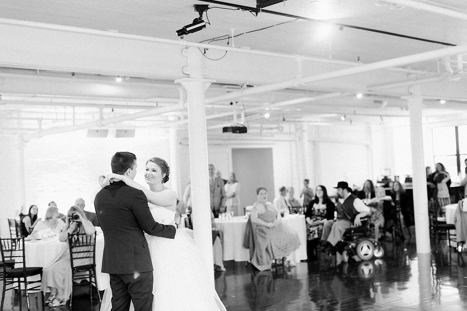 Arielle Peters Photography | Bride and groom sharing first dance at wedding reception at Loft 310 in Kalamazoo, Michigan.