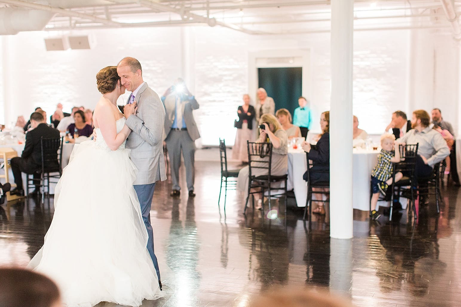 Arielle Peters Photography | Father of bride and bride sharing a dance at wedding reception at Loft 310 in Kalamazoo, Michigan.