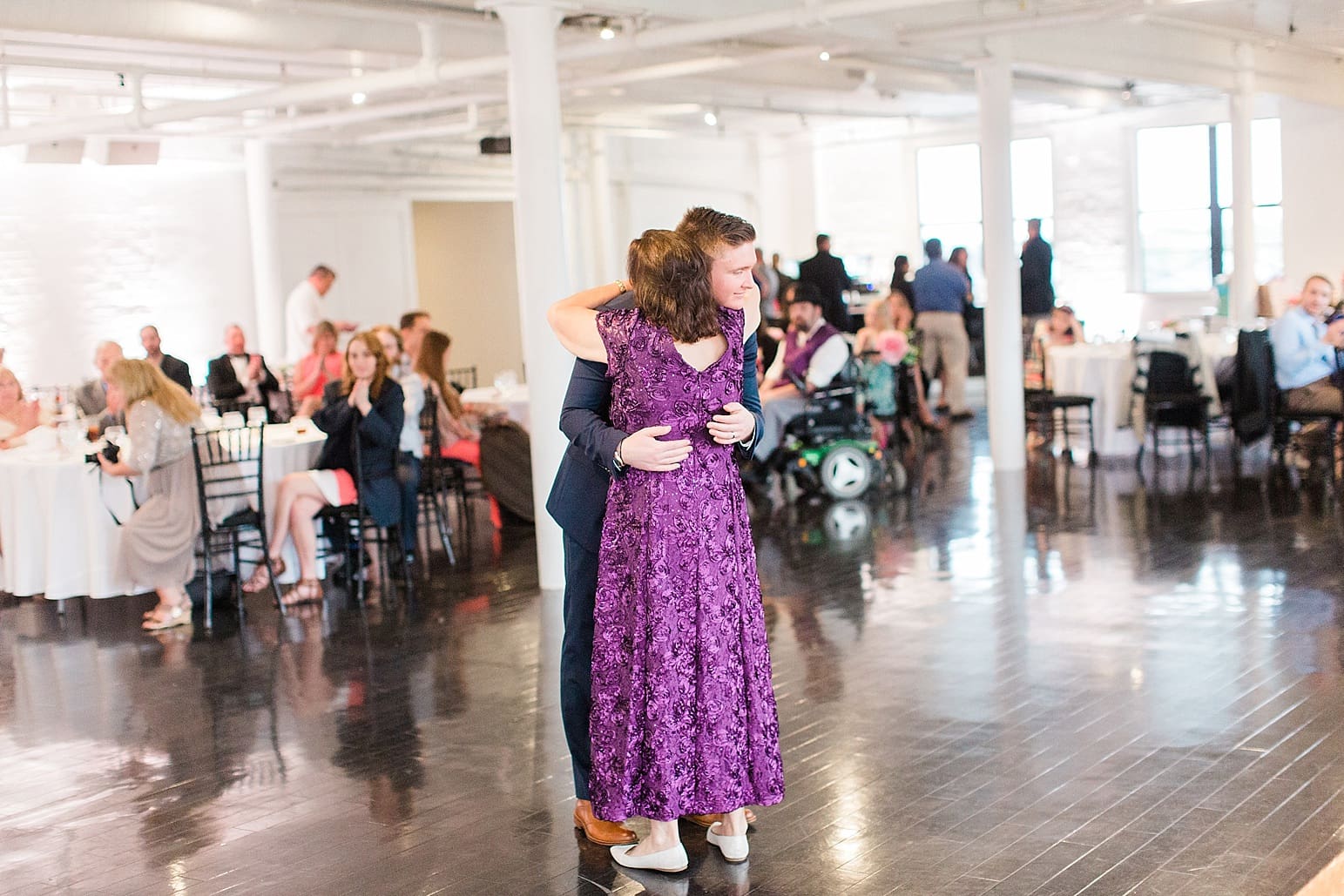 Arielle Peters Photography | Mother of groom and groom sharing a dance at wedding reception at Loft 310 in Kalamazoo, Michigan.