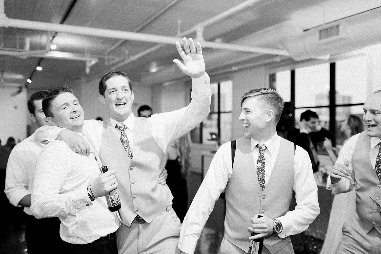 Arielle Peters Photography | Groom dancing with guests at wedding reception at Loft 310 in Kalamazoo, Michigan.