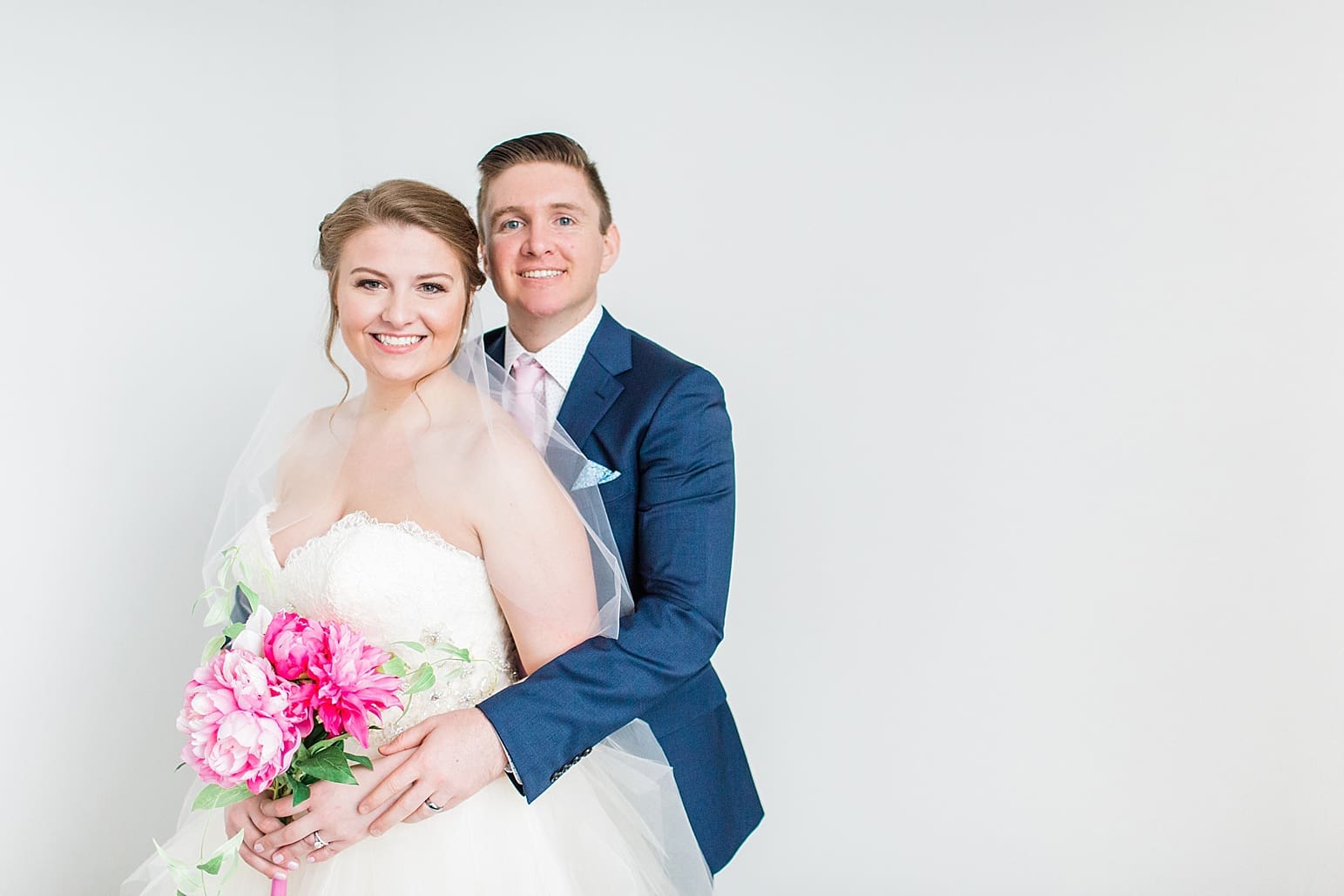 Arielle Peters Photography | Bride and groom in loft on wedding day at Loft 310 in Kalamazoo, Michigan.