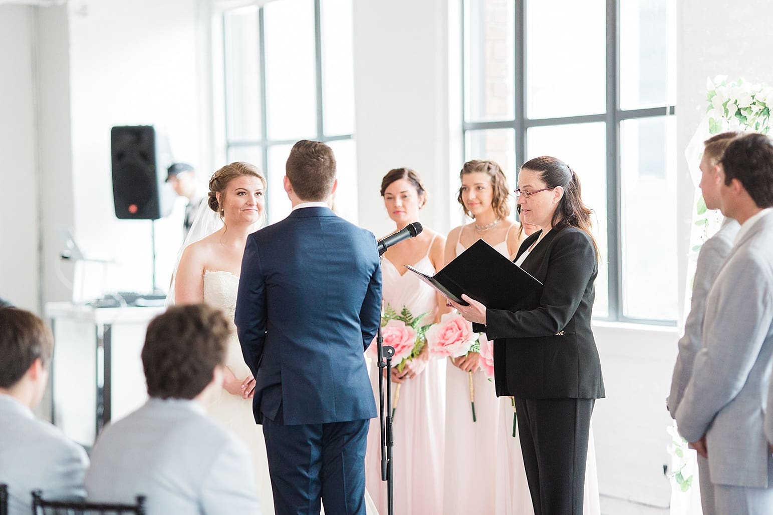 Arielle Peters Photography | Bride and groom standing at the alter on wedding day at Loft 310 in Kalamazoo, Michigan.
