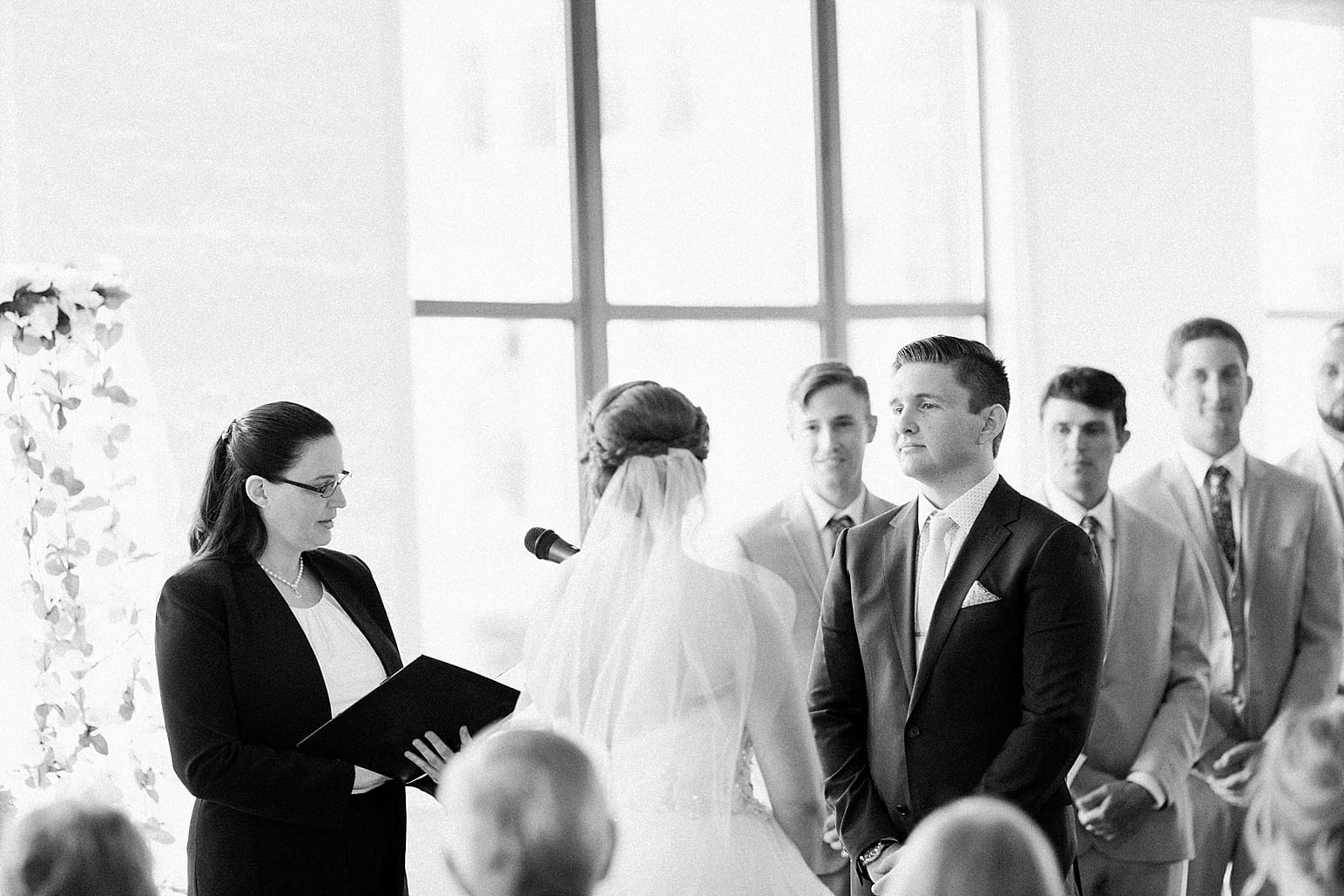 Arielle Peters Photography | Bride and groom standing at the alter on wedding day at Loft 310 in Kalamazoo, Michigan.