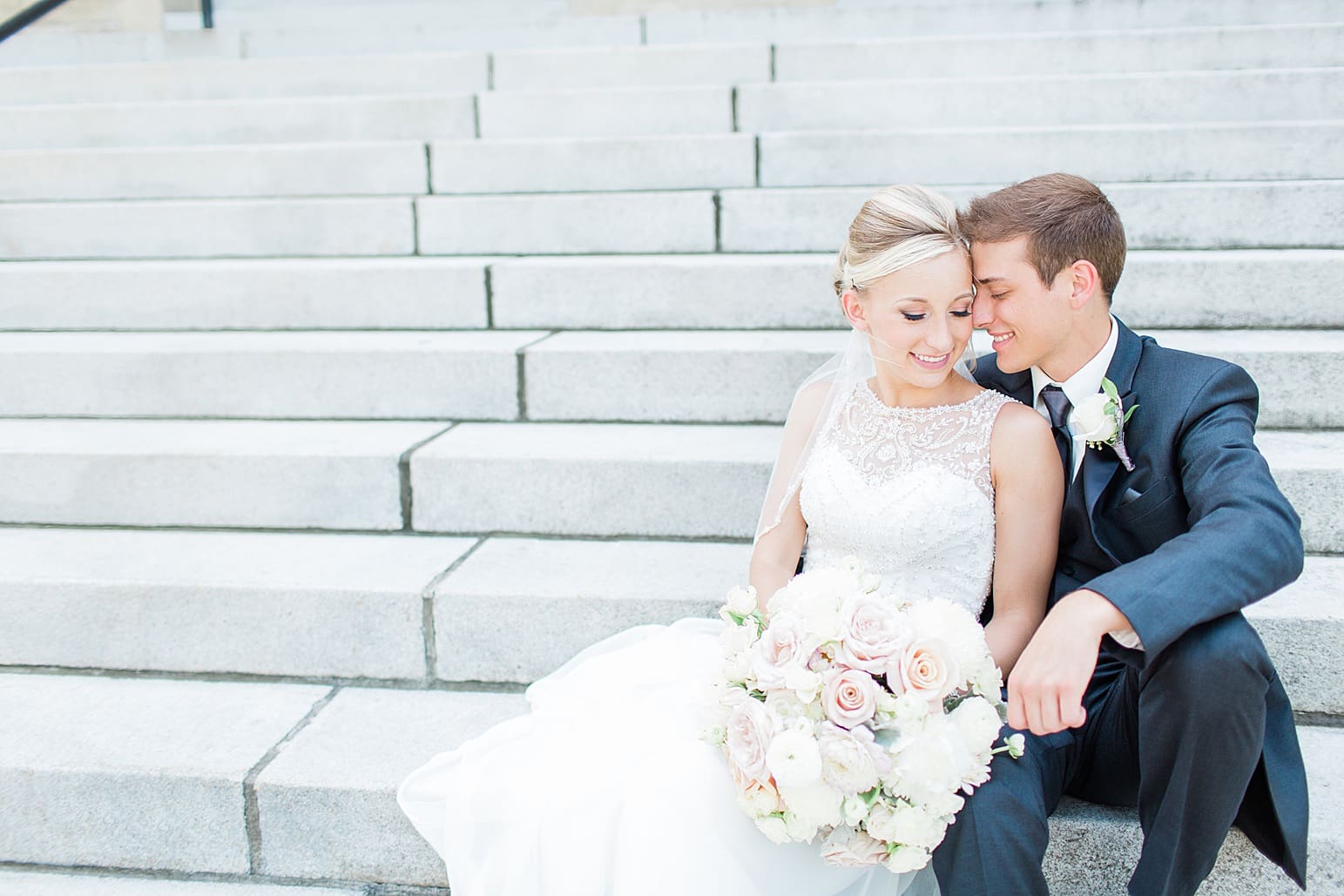 Arielle Peters Photography taking a couple’s wedding day photos at the Spohn Ballroom in Goshen, Indiana.