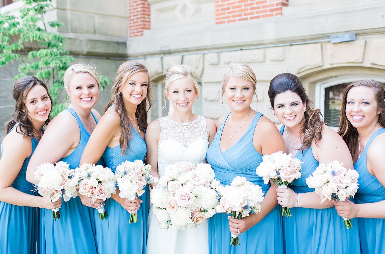 Arielle Peters Photography | Bride and bridesmaids outside the church on wedding day at the Spohn Ballroom in Goshen, Indiana.
