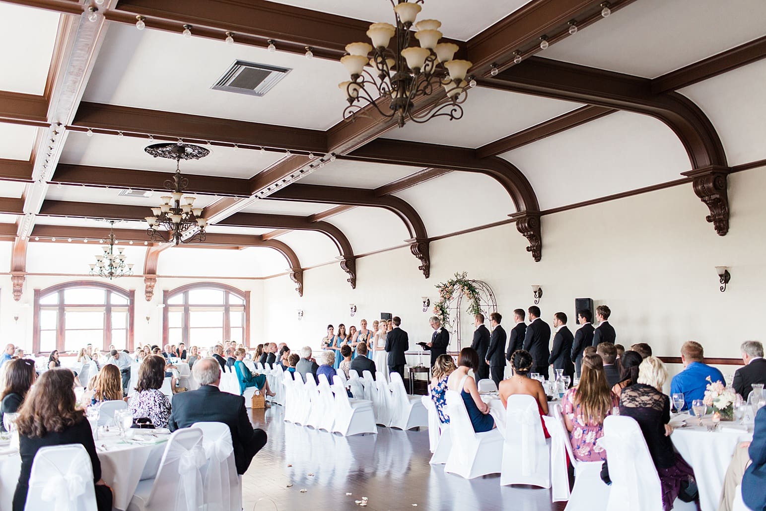 Arielle Peters Photography | Bride and groom standing at the alter on wedding day at the Spohn Ballroom in Goshen, Indiana.
