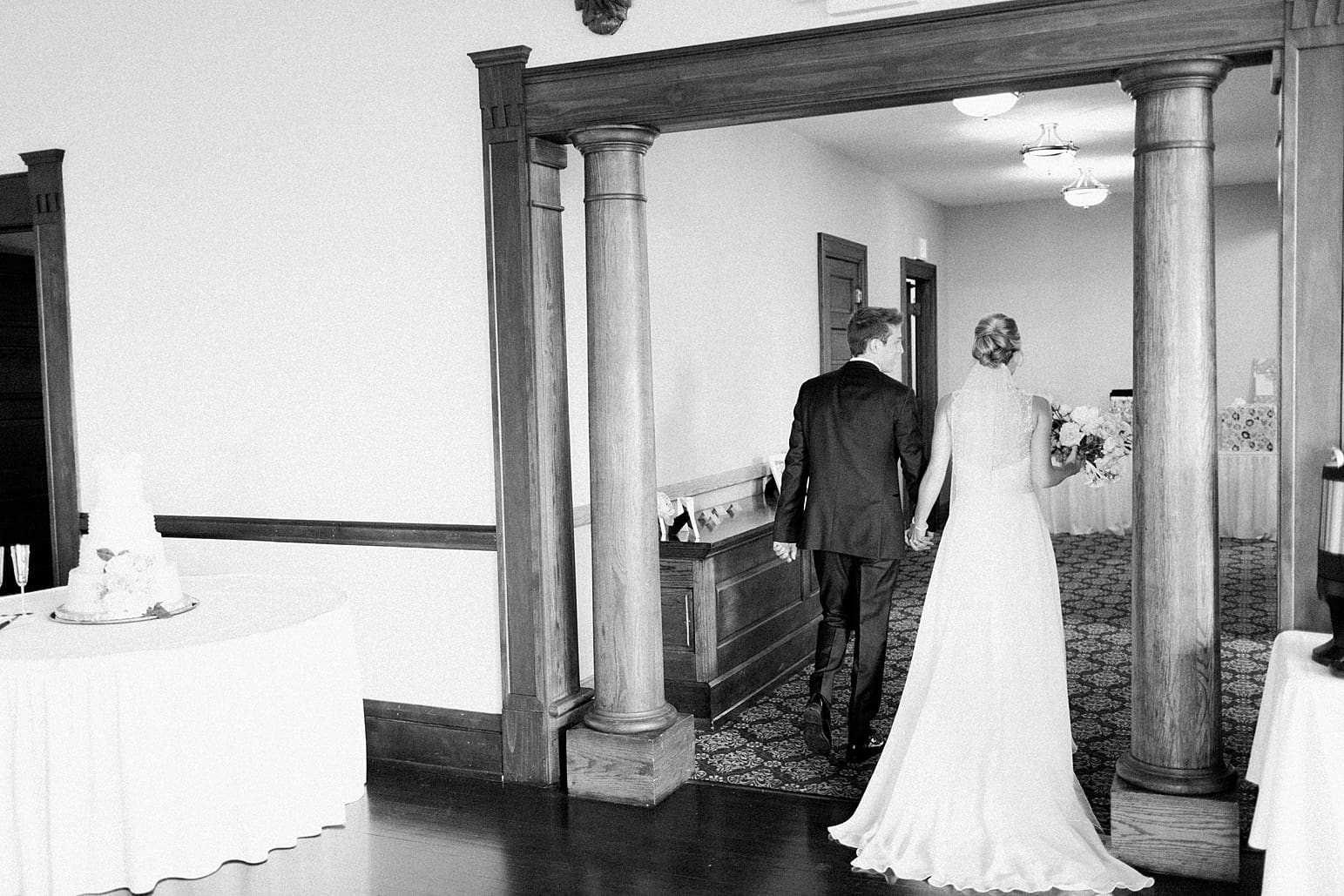 Arielle Peters Photography | Bride and groom walking down the aisle on wedding day at the Spohn Ballroom in Goshen, Indiana.