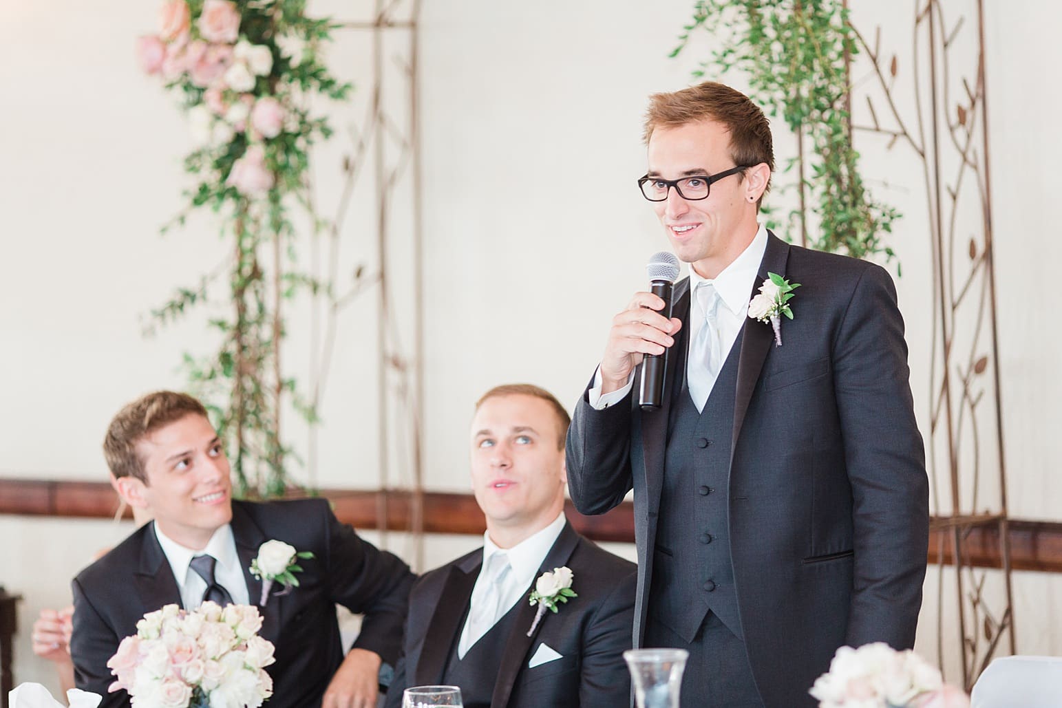 Arielle Peters Photography | Best man toasting at wedding reception on wedding day at the Spohn Ballroom in Goshen, Indiana.