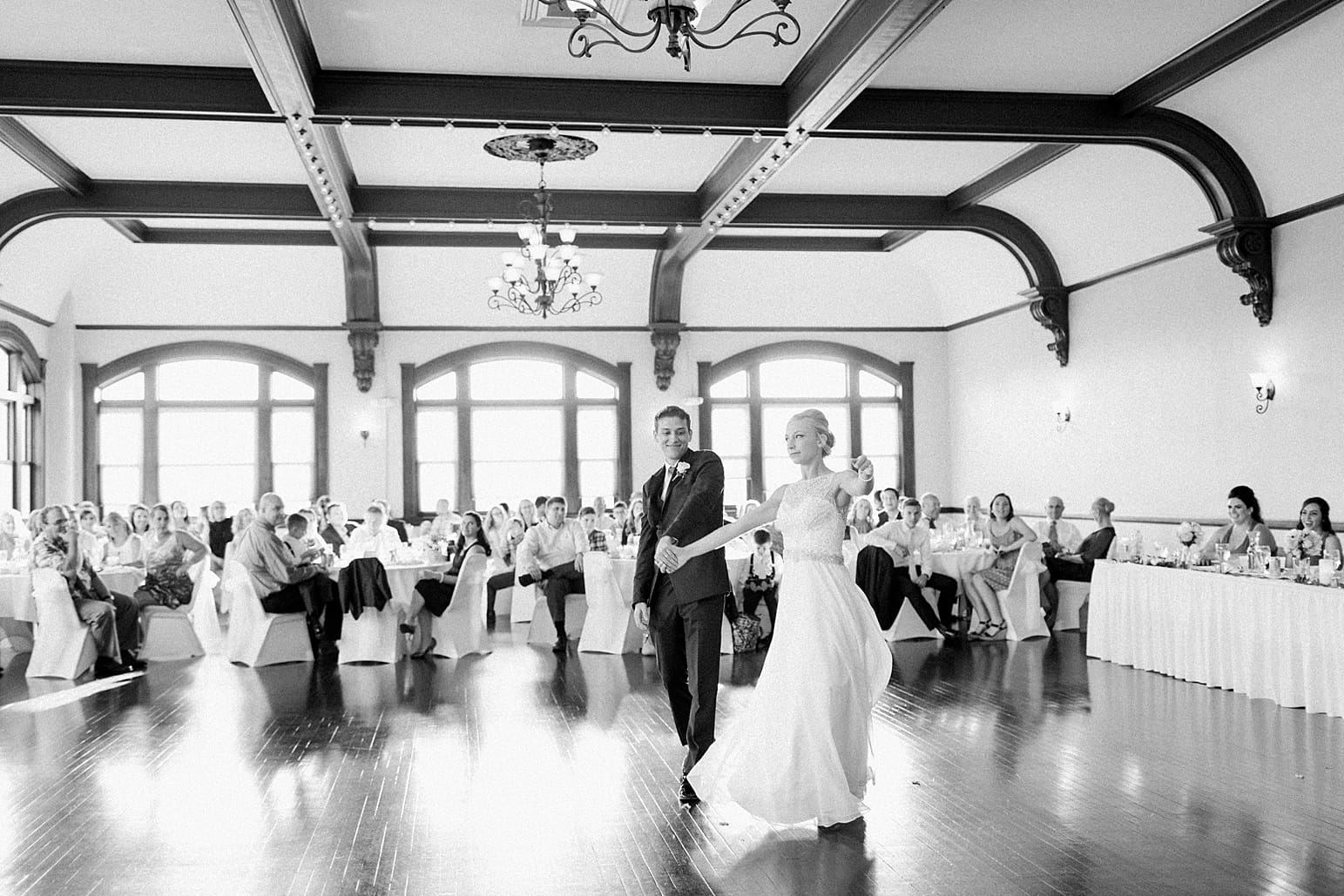 Arielle Peters Photography | Bride and groom sharing first dance at wedding reception on wedding day at the Spohn Ballroom in Goshen, Indiana.