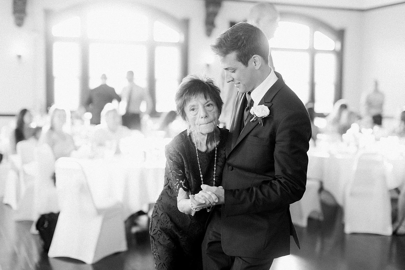 Arielle Peters Photography | Groom dancing with grandma at wedding reception on wedding day at the Spohn Ballroom in Goshen, Indiana.