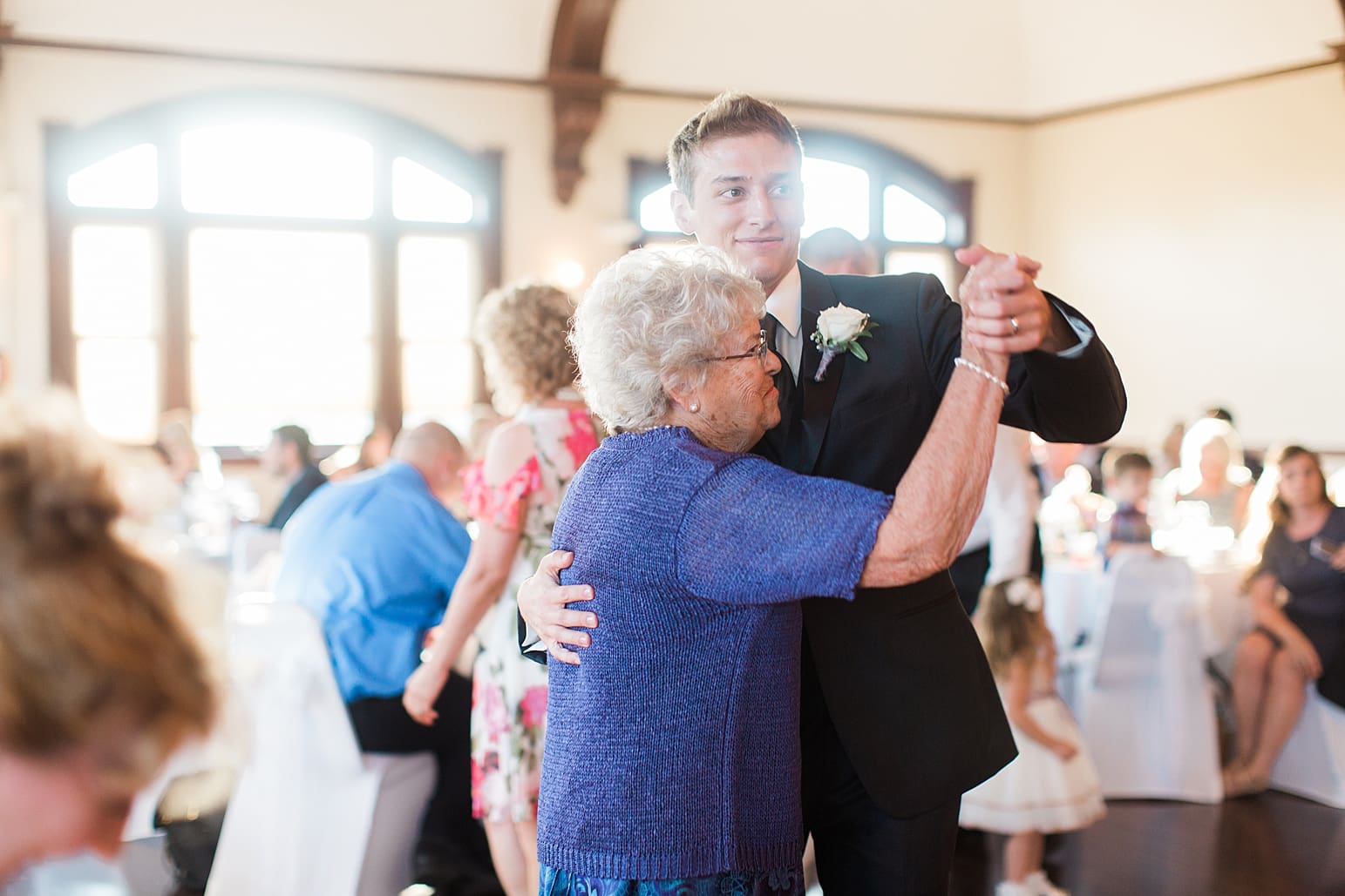 Arielle Peters Photography | Groom dancing with grandma at wedding reception on wedding day at the Spohn Ballroom in Goshen, Indiana.
