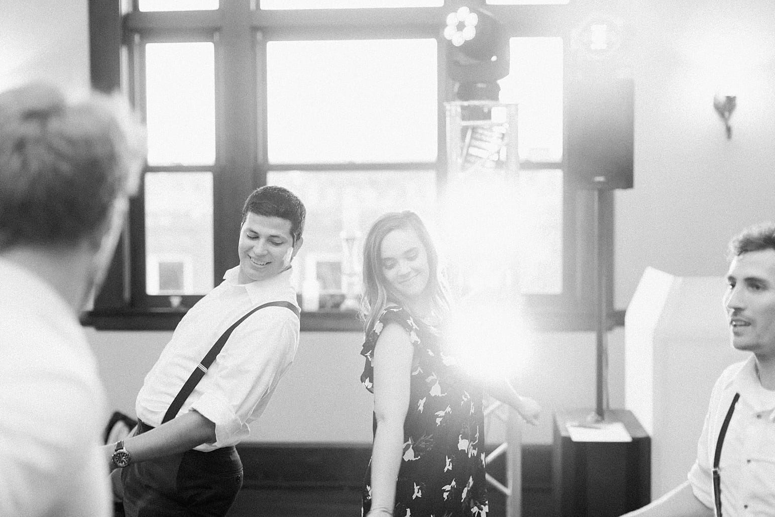 Arielle Peters Photography | Wedding guests dancing at wedding reception on wedding day at the Spohn Ballroom in Goshen, Indiana.