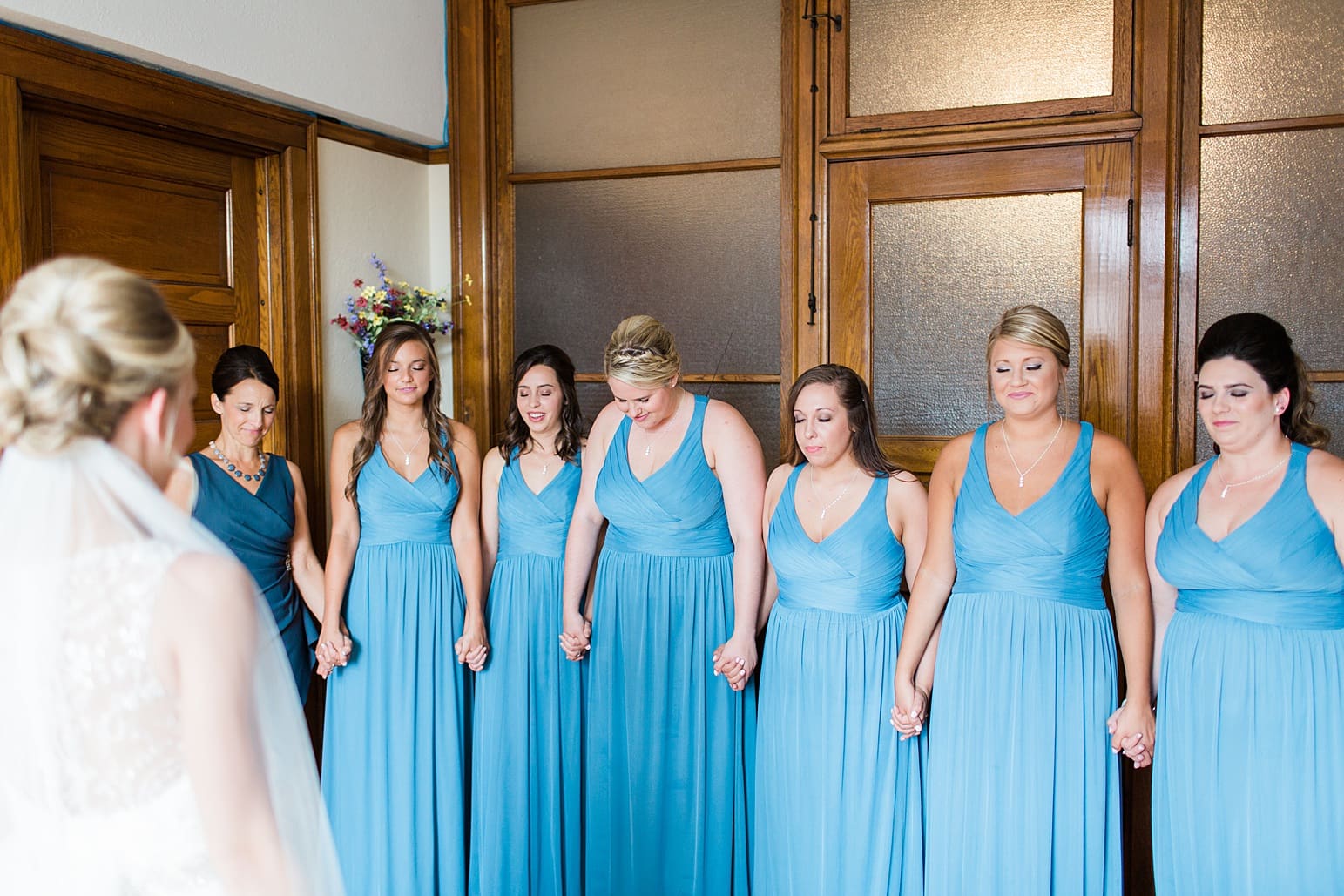 Arielle Peters Photography | Bride and bridesmaids having first reveal on wedding day at the Spohn Ballroom in Goshen, Indiana.
