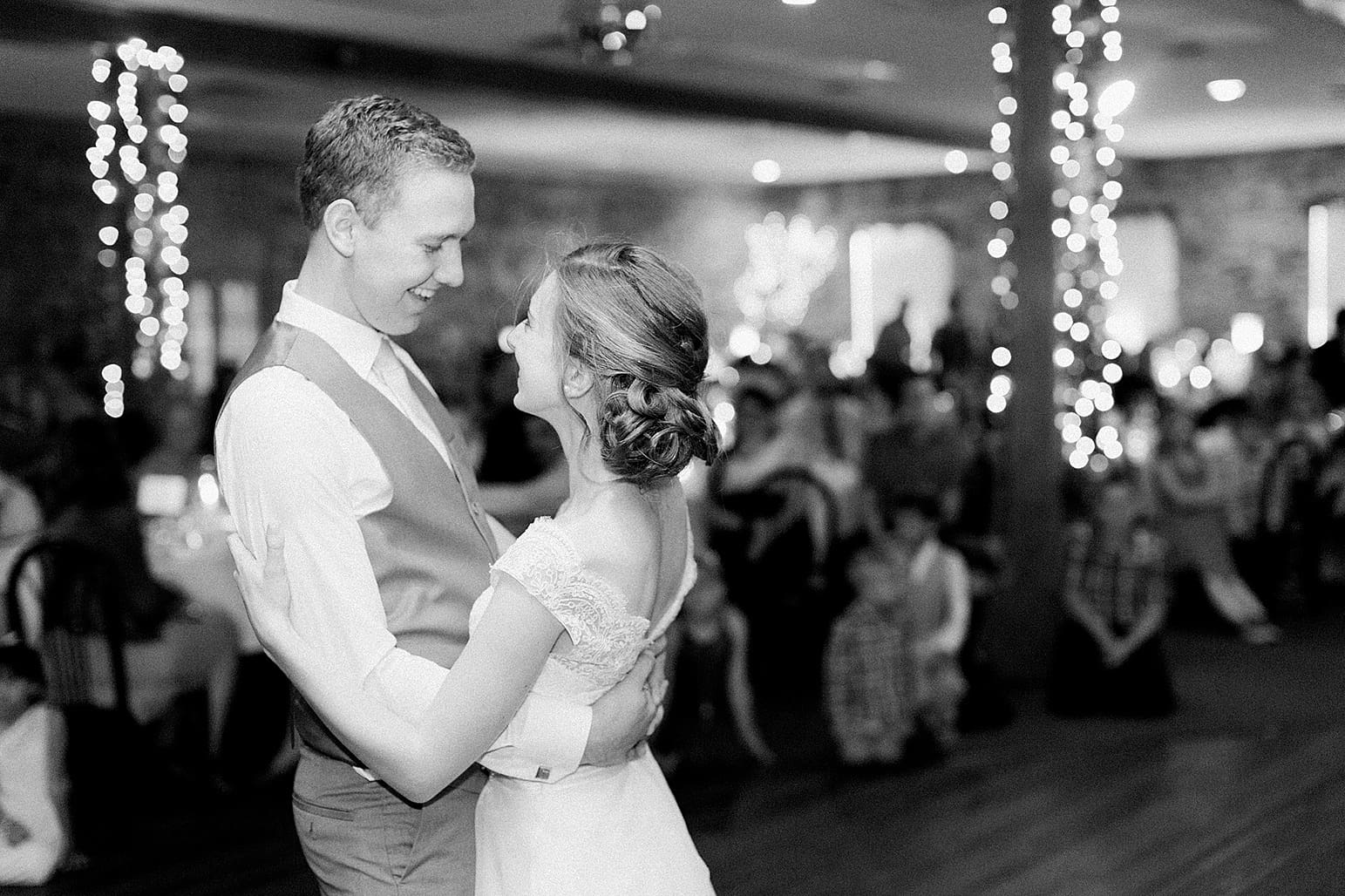 Arielle Peters Photography | Bride and groom sharing first dance at wedding reception at Lawton Lions Heritage Community Center in Lawton, Michigan.