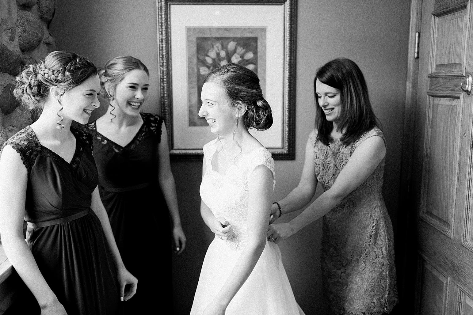 Arielle Peters Photography | Mother of bride helping bride get ready on wedding day at Lawton Lions Heritage Community Center in Lawton, Michigan.