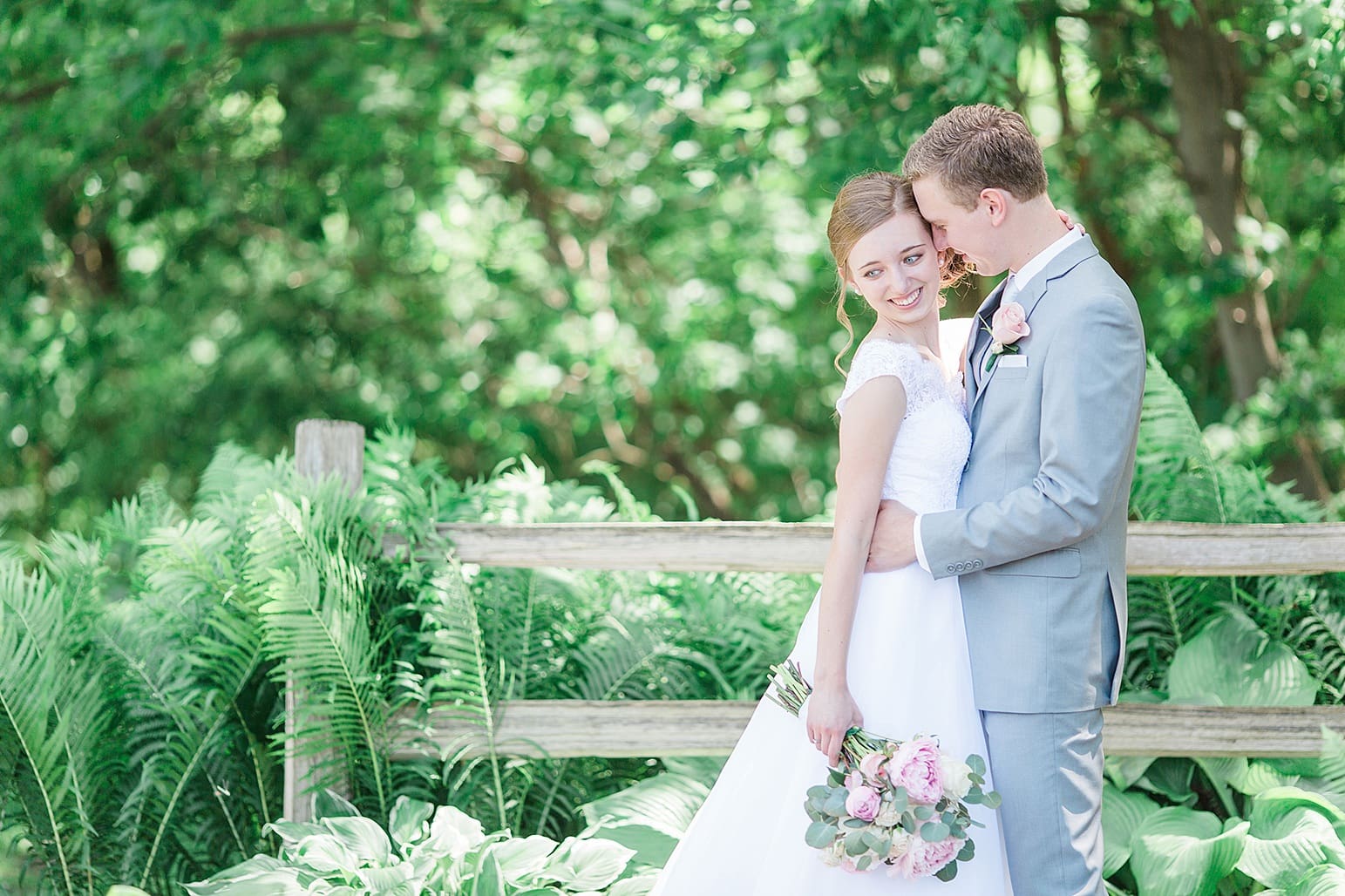 Arielle Peters Photography | Bride and groom in the garden on wedding day at Lawton Lions Heritage Community Center in Lawton, Michigan.