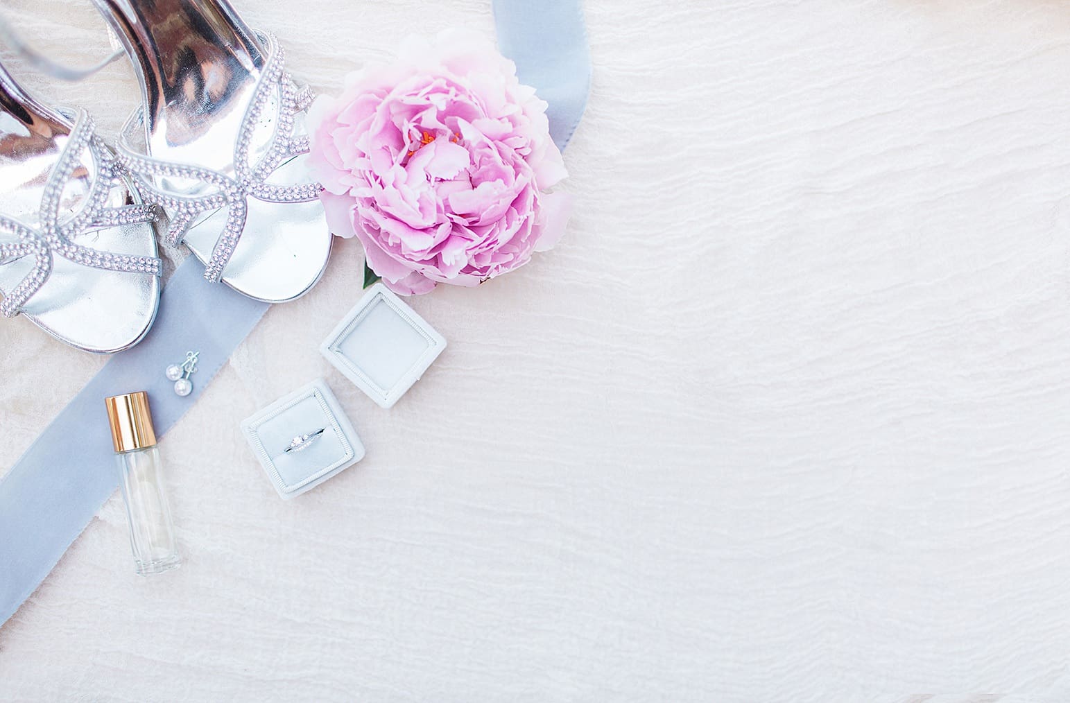 Arielle Peters Photography | Bride shoes and jewelry on wedding day at Lawton Lions Heritage Community Center in Lawton, Michigan.