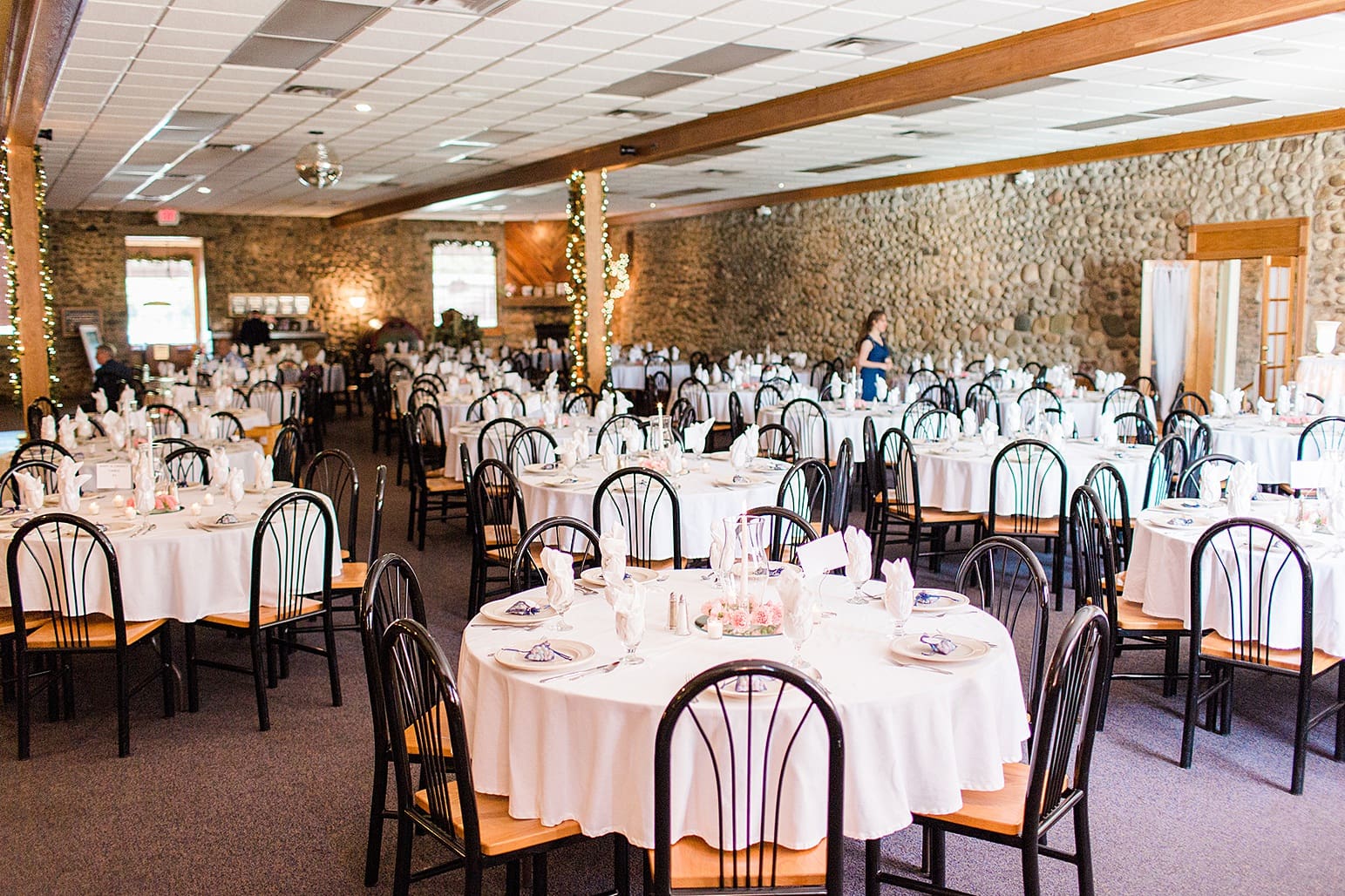 Arielle Peters Photography | Wedding reception table settings and floral arrangements at Lawton Lions Heritage Community Center in Lawton, Michigan.