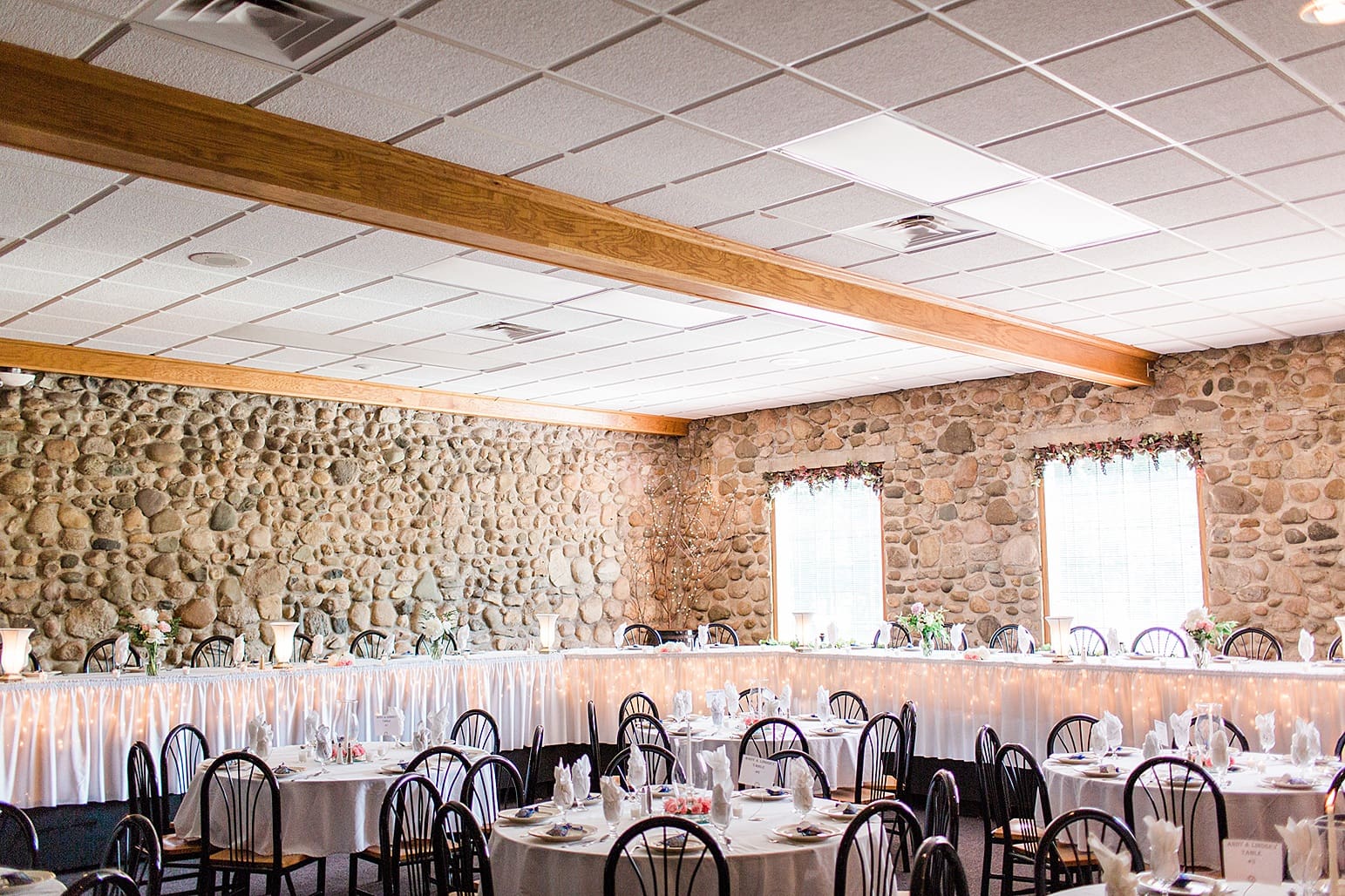 Arielle Peters Photography | Wedding reception table settings and floral arrangements at Lawton Lions Heritage Community Center in Lawton, Michigan.