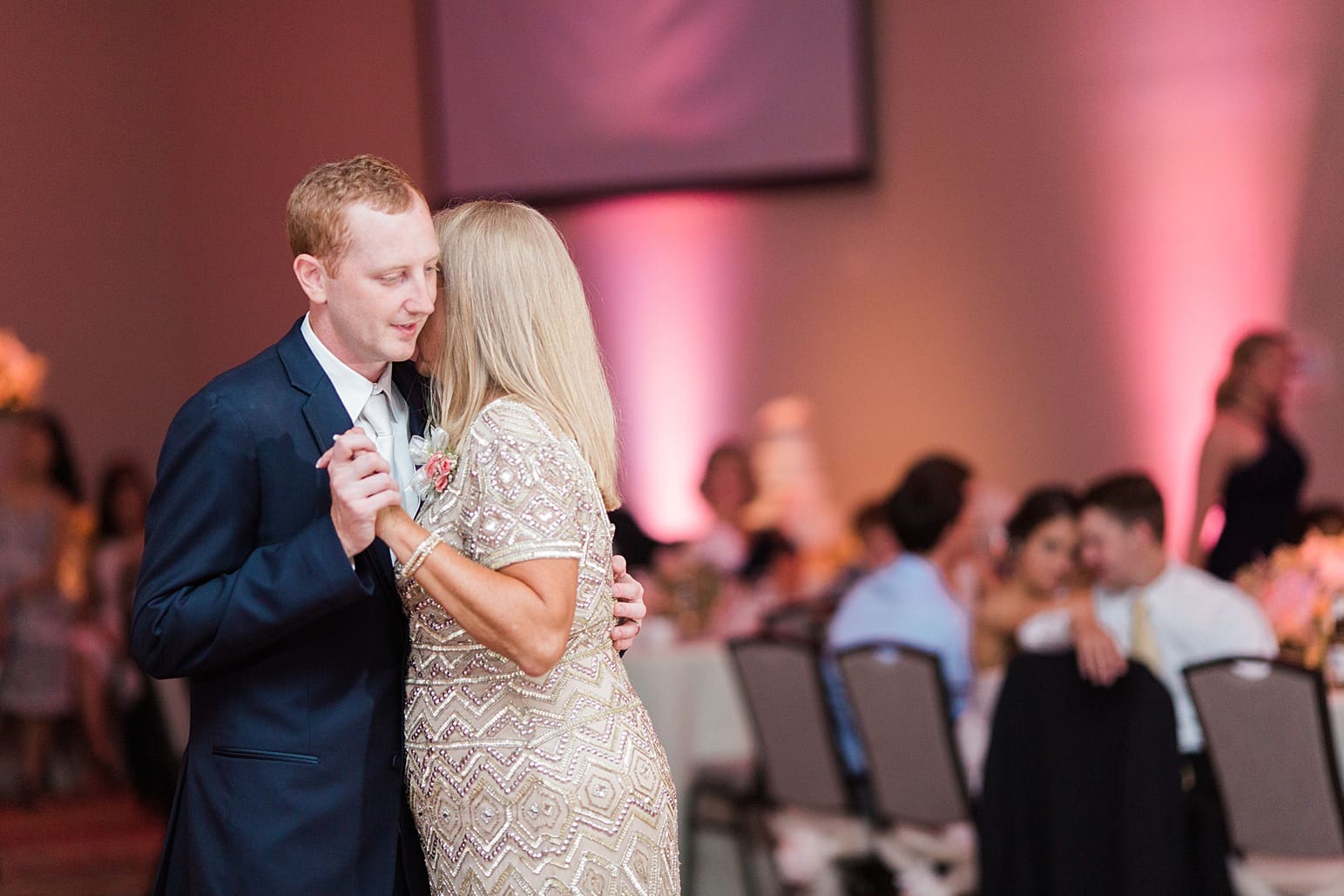 Arielle Peters Photography | Mother of groom and groom sharing a dance at wedding reception at the Holiday Inn in Mishawaka, Indiana.