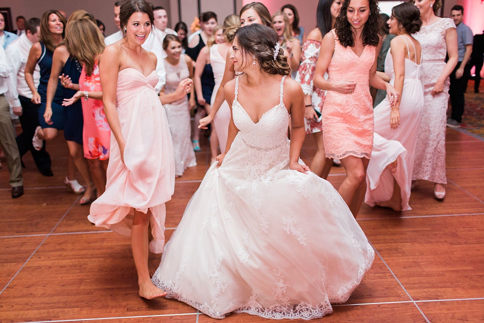 Arielle Peters Photography | Bride dancing at wedding reception at the Holiday Inn in Mishawaka, Indiana.